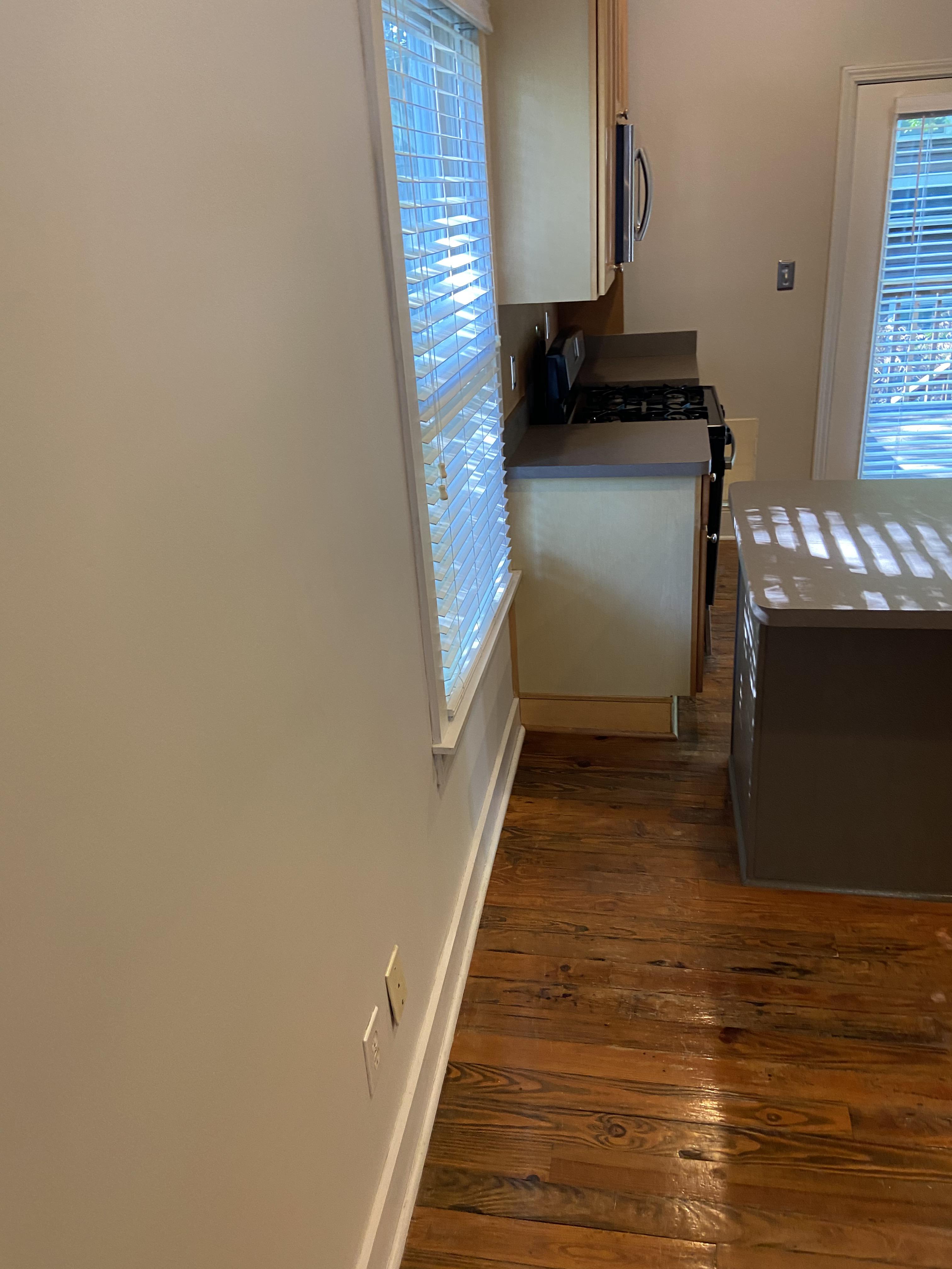 How to deal with low window in kitchen? It’s already low on counter