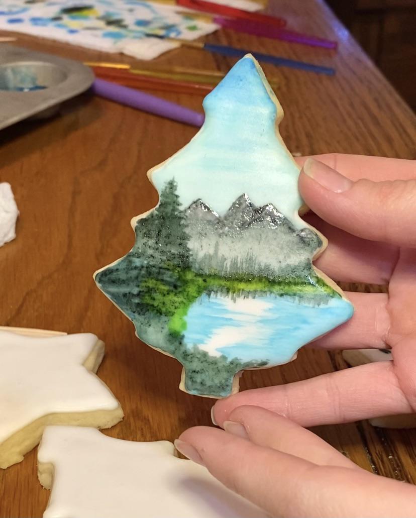 I followed a Bob Ross tutorial on a cookie. r/cookiedecorating