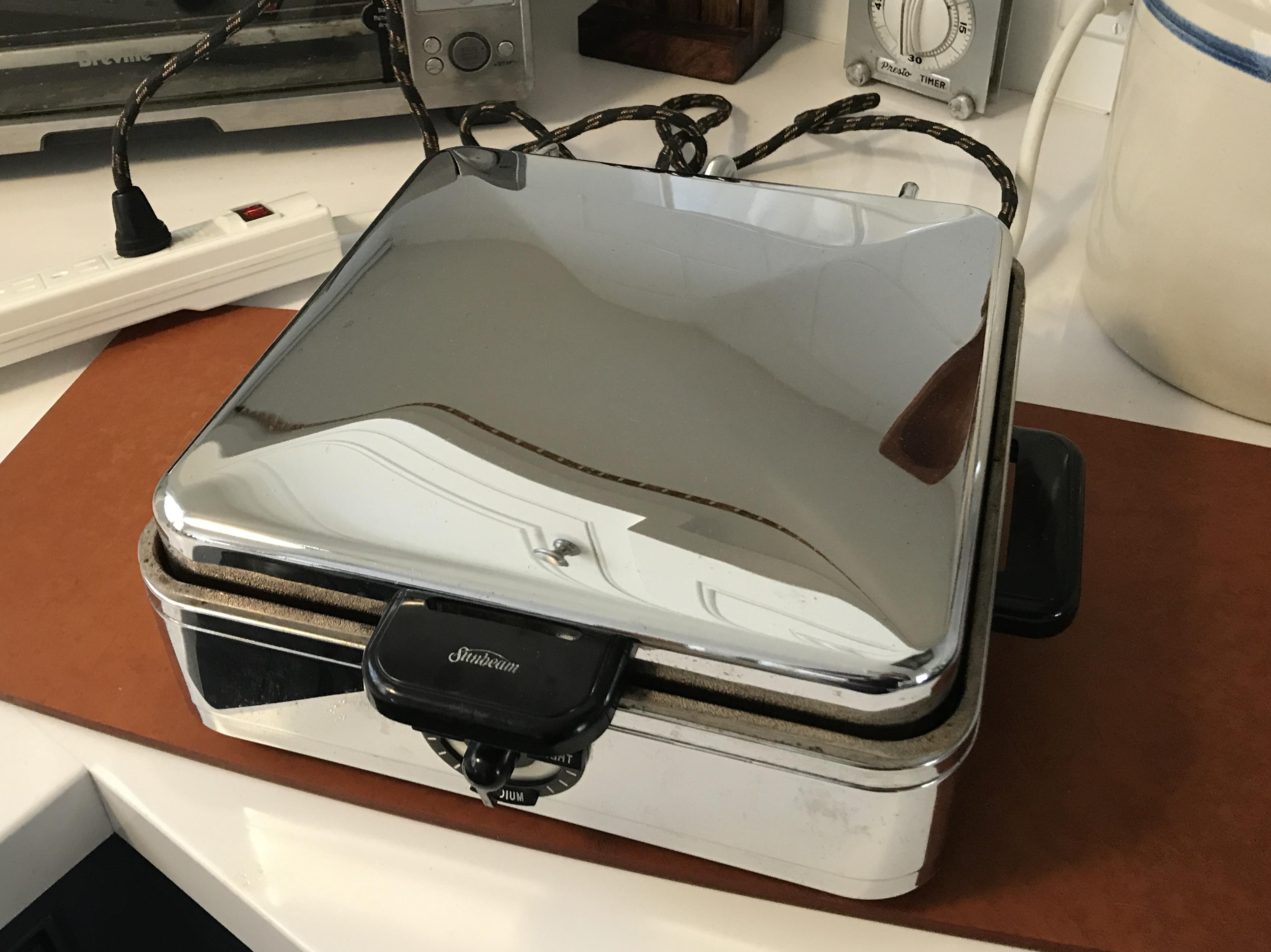 Seasoning my newtome Sunbeam Model W2 Waffle Maker. Info in comments