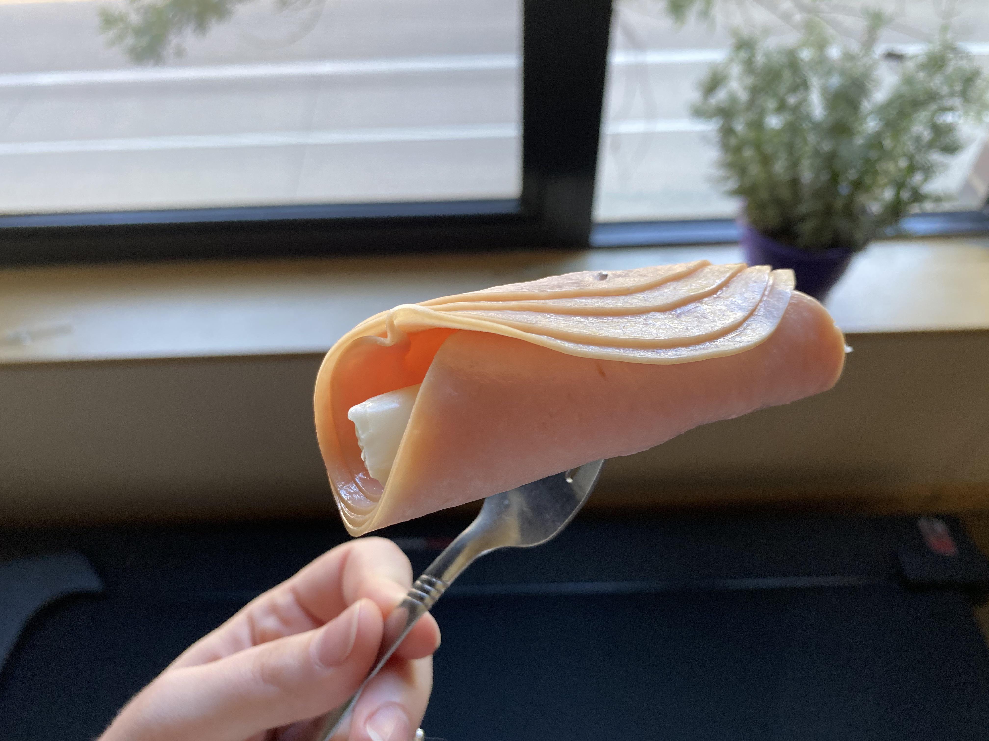 A 2 minute dinner string cheese wrapped in deli meat plus a side of