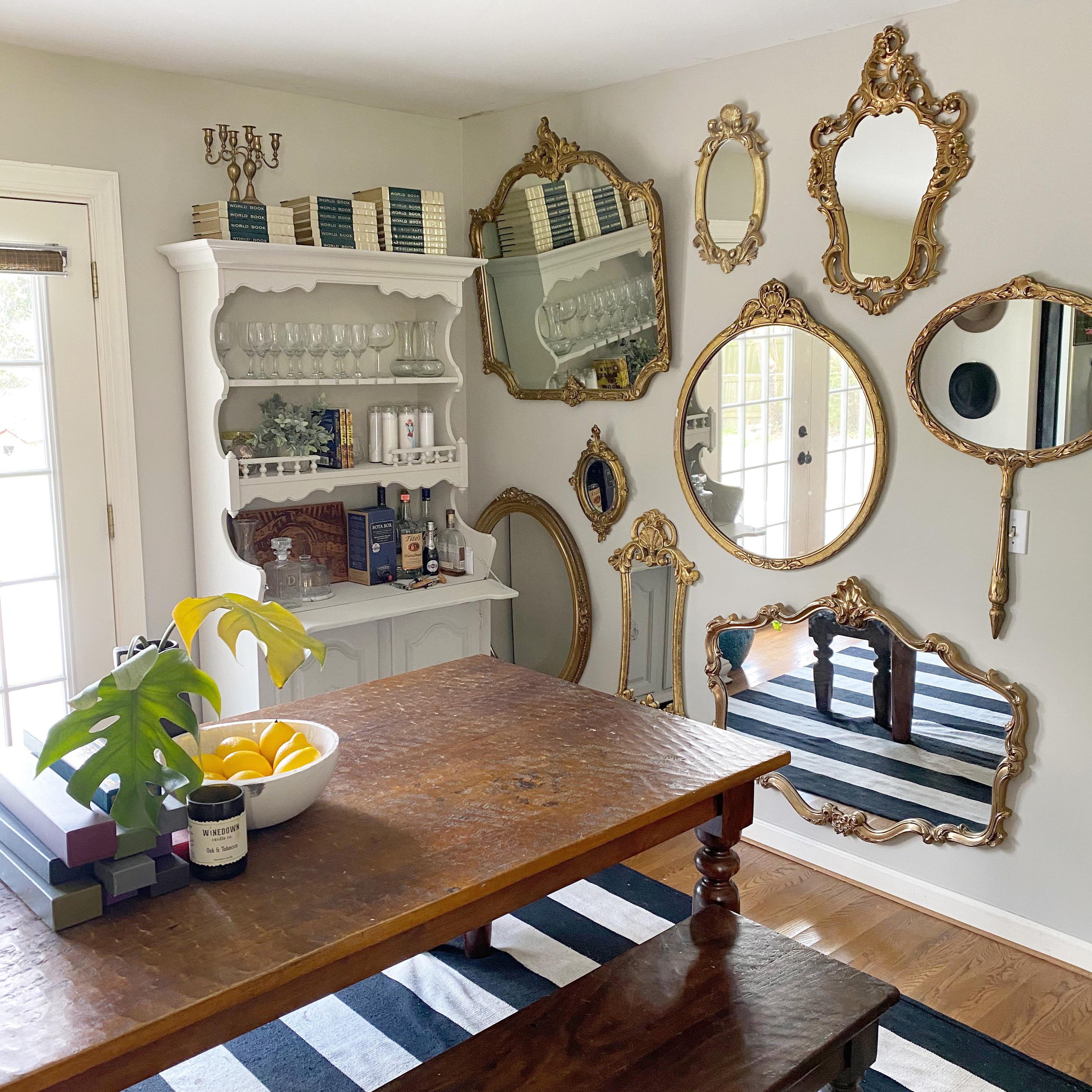 Moved into our new house and made a gallery wall with antique mirrors
