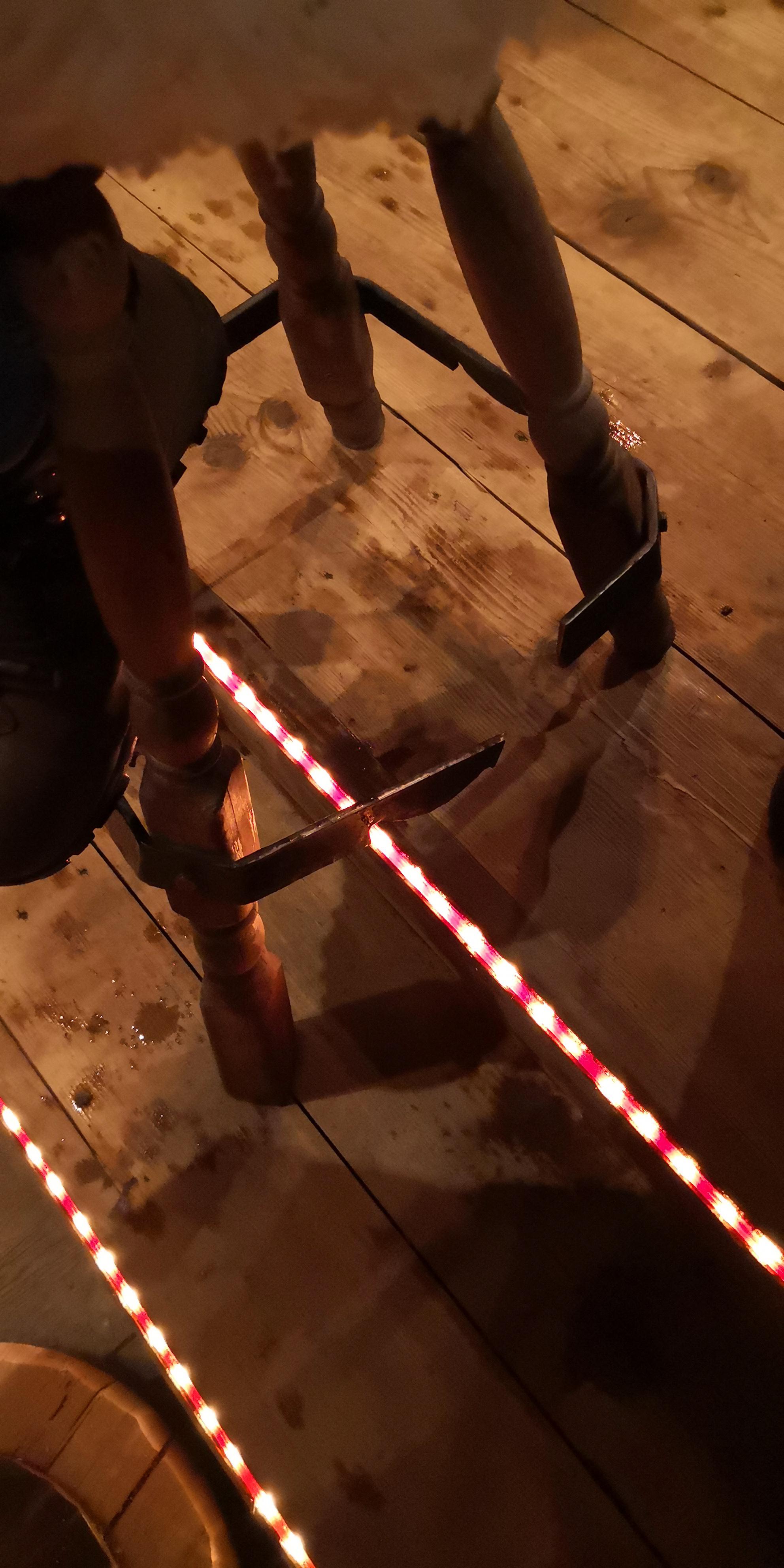 This barstool has its legs cut to fit on a step r/mildlyinteresting