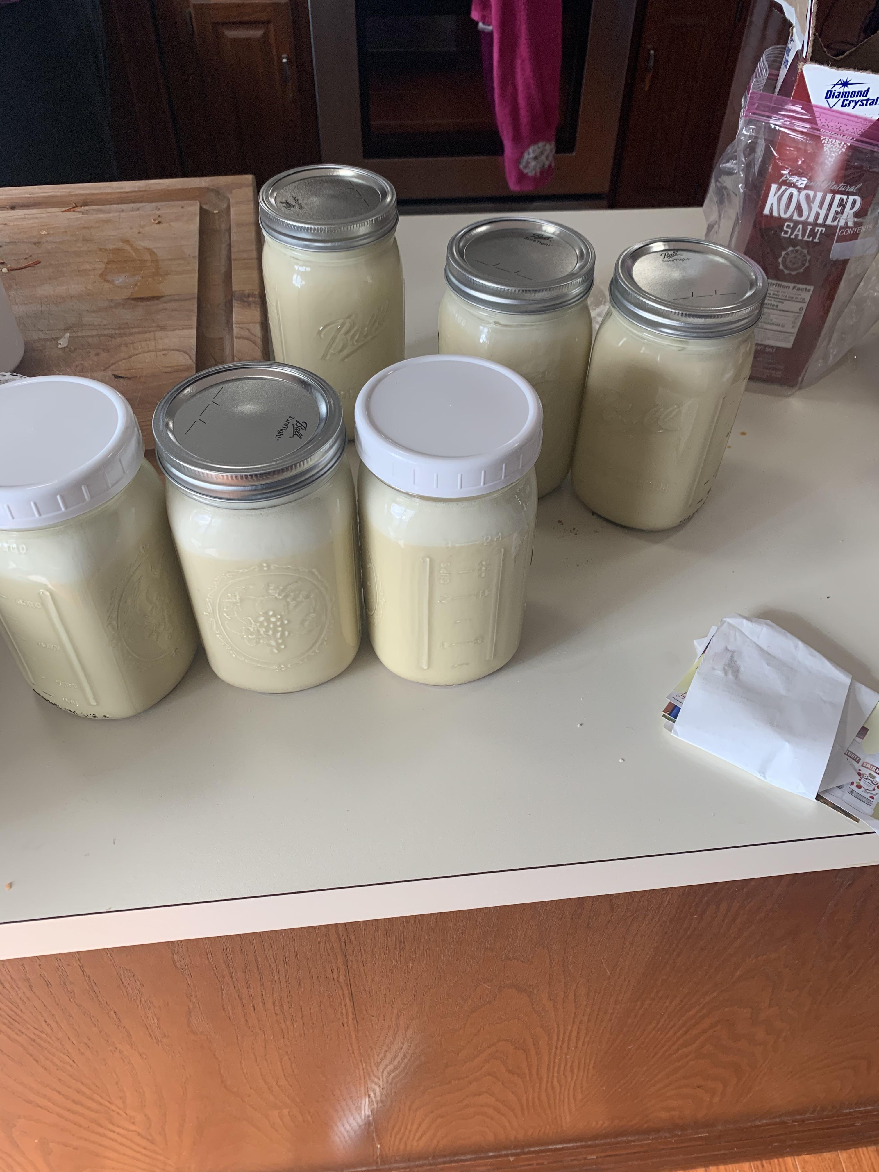 2 batches of Alton Brown’s aged eggnog going in the fridge for the