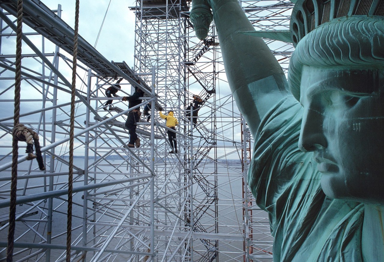 Workers on the scaffolding of the restoration project of the Statue of