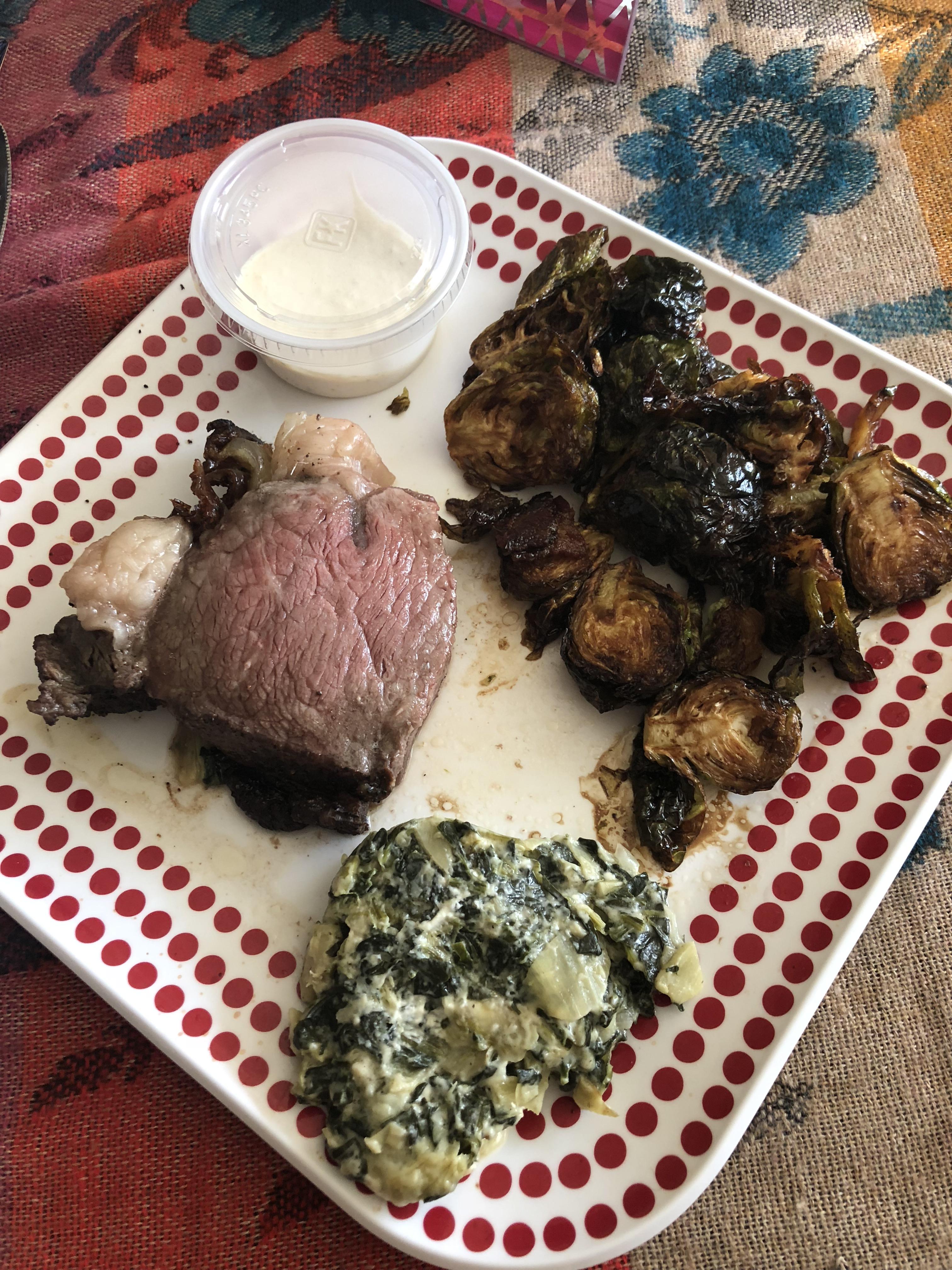 Prime rib, roasted garlic brussel sprouts and creamed spinach, what