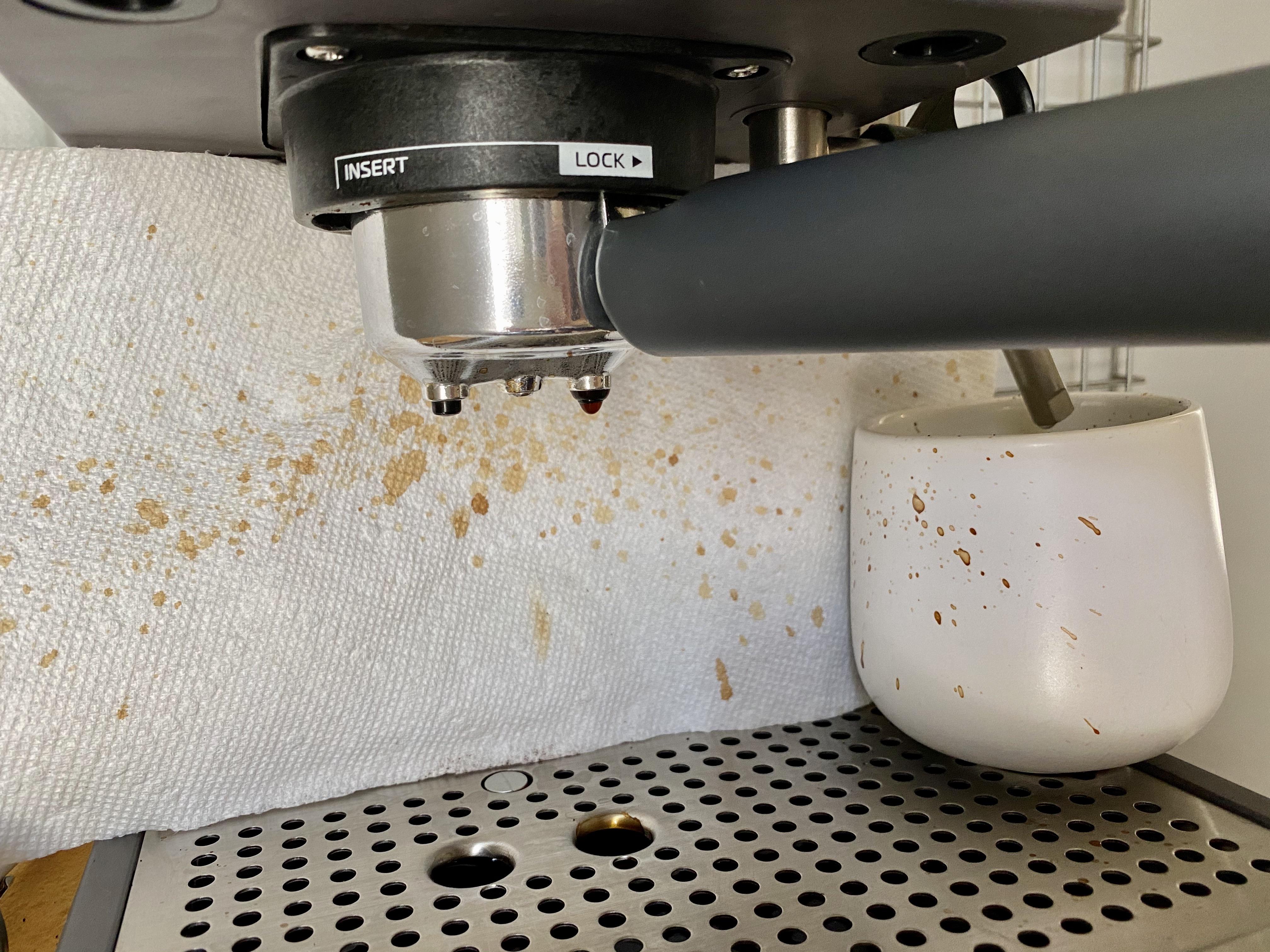 Breville Cafe Roma spraying fine mist while pulling shot with stock