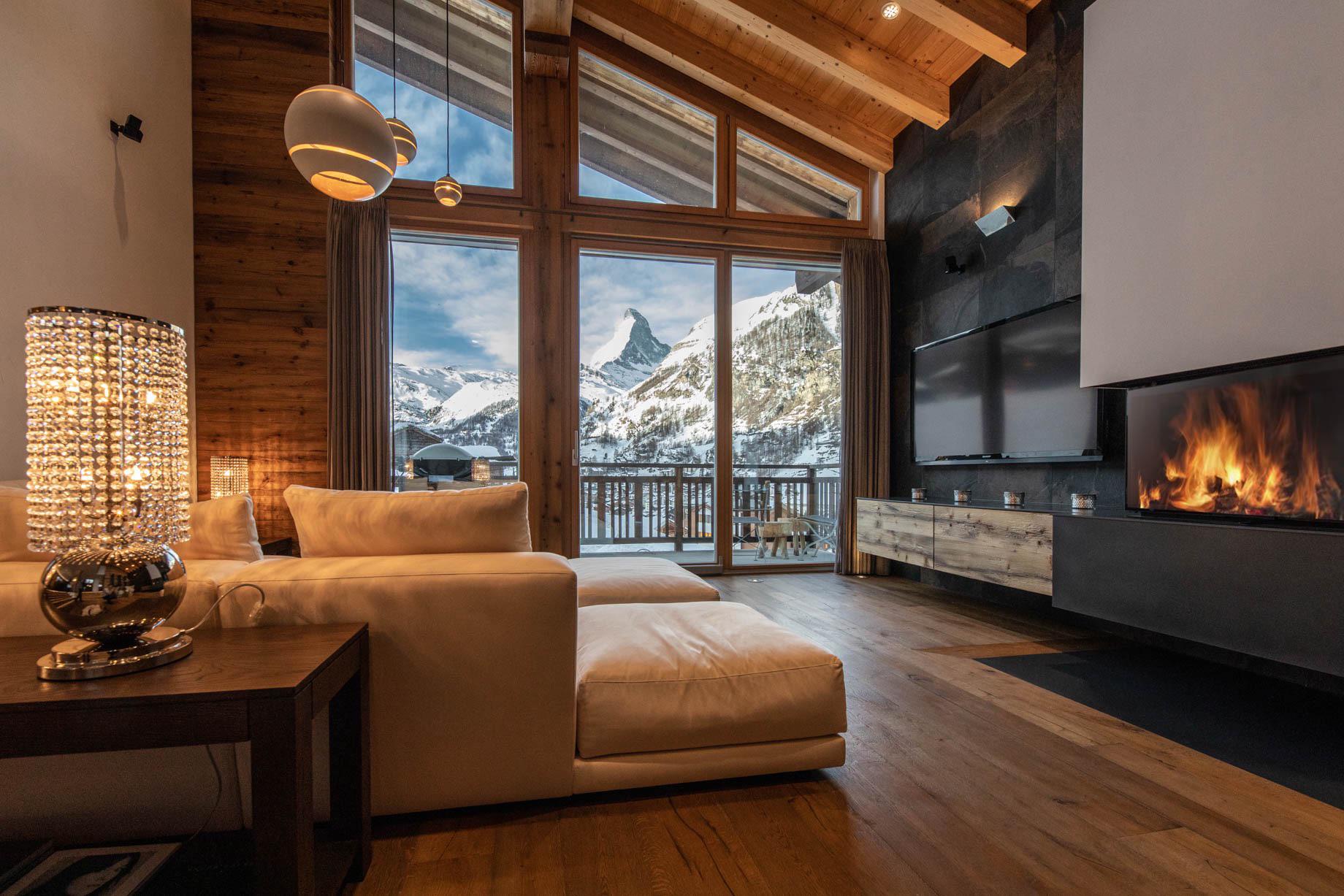 Super cozy living room with mountain views in Switzerland by Luxury 778