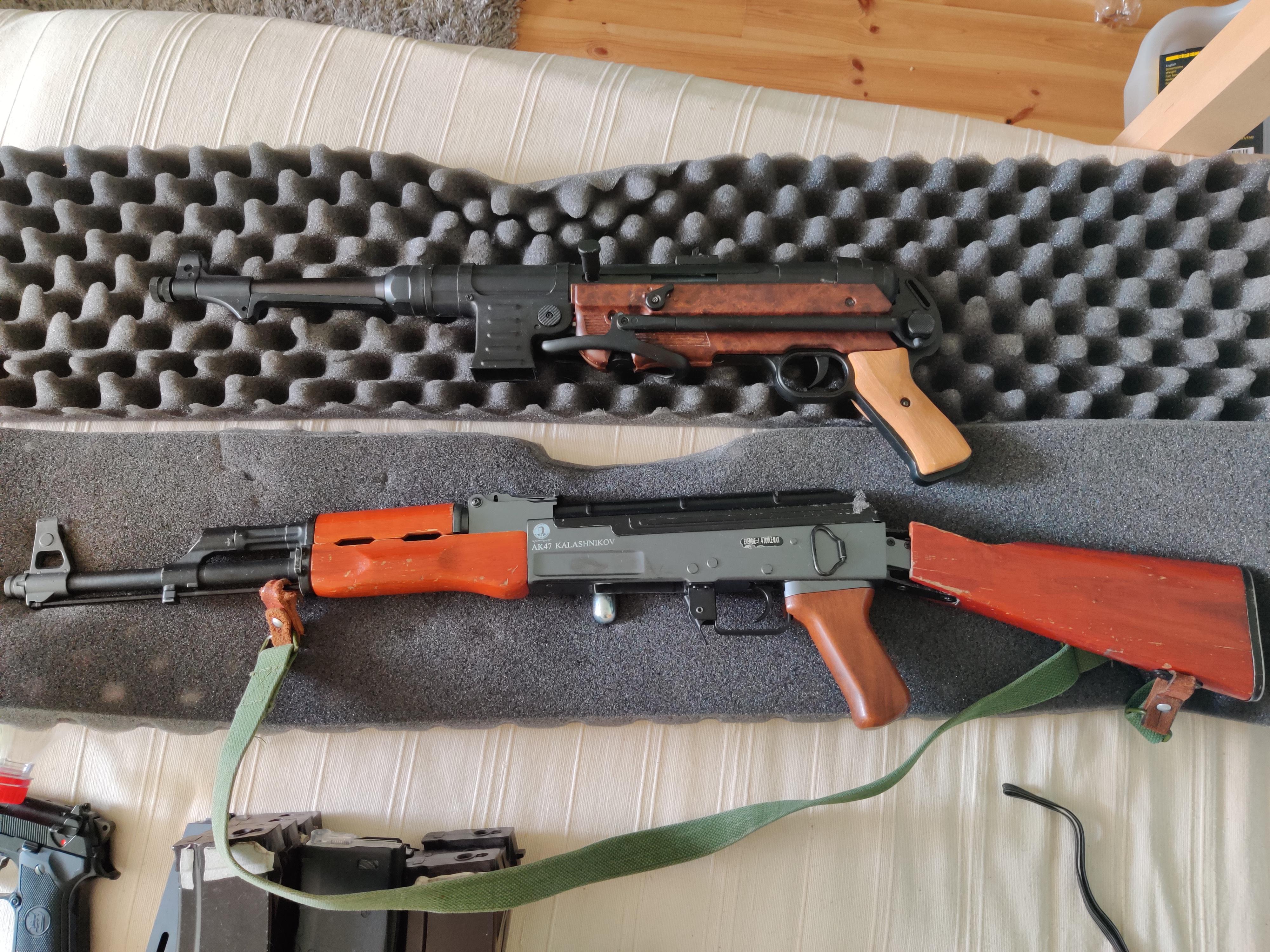 My wooden bois with two toned MP40 and real steel stock and handguard AK47 r/airsoft
