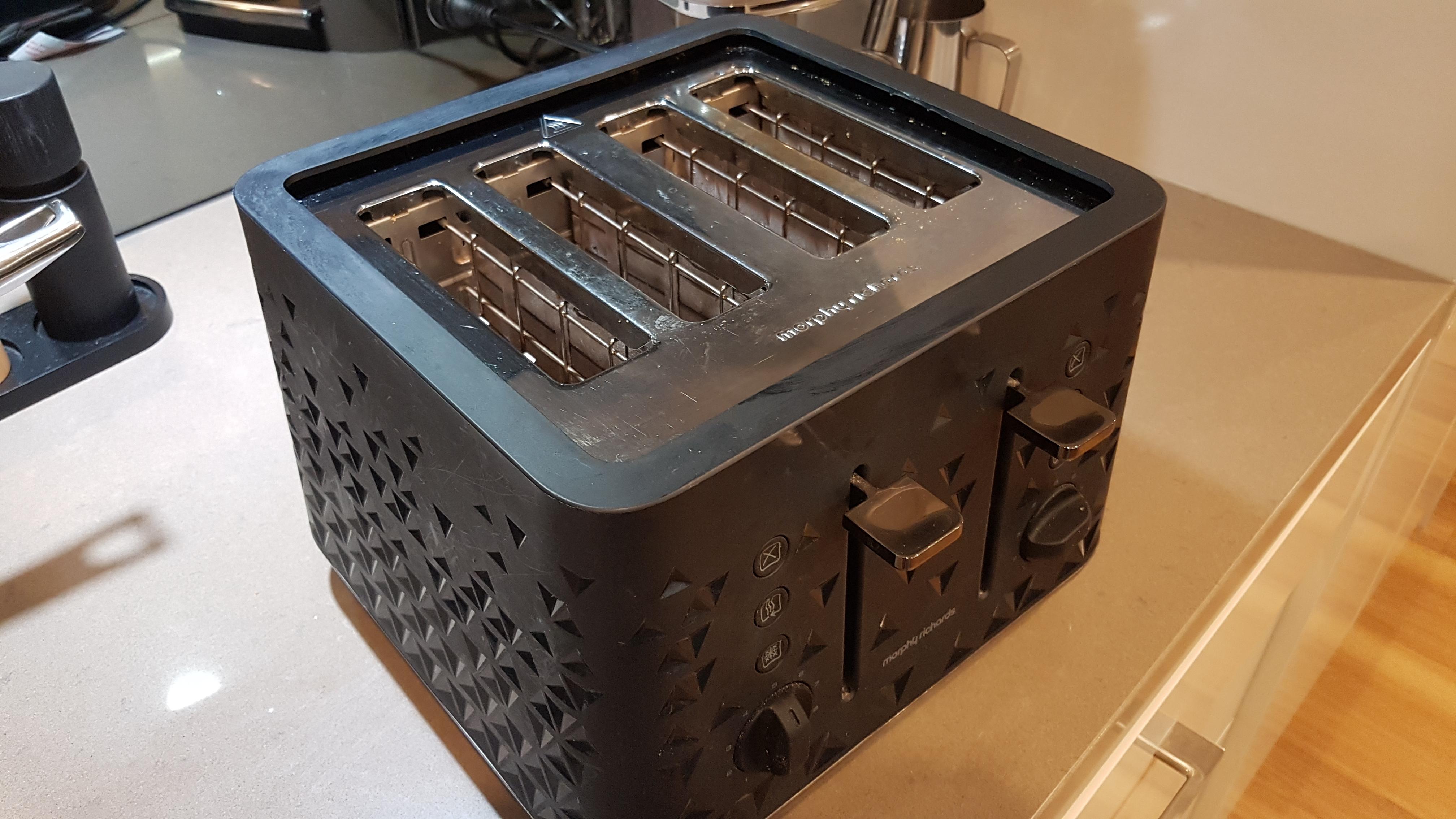 This 4 slot toaster allows me to have a club sandwich and still have a