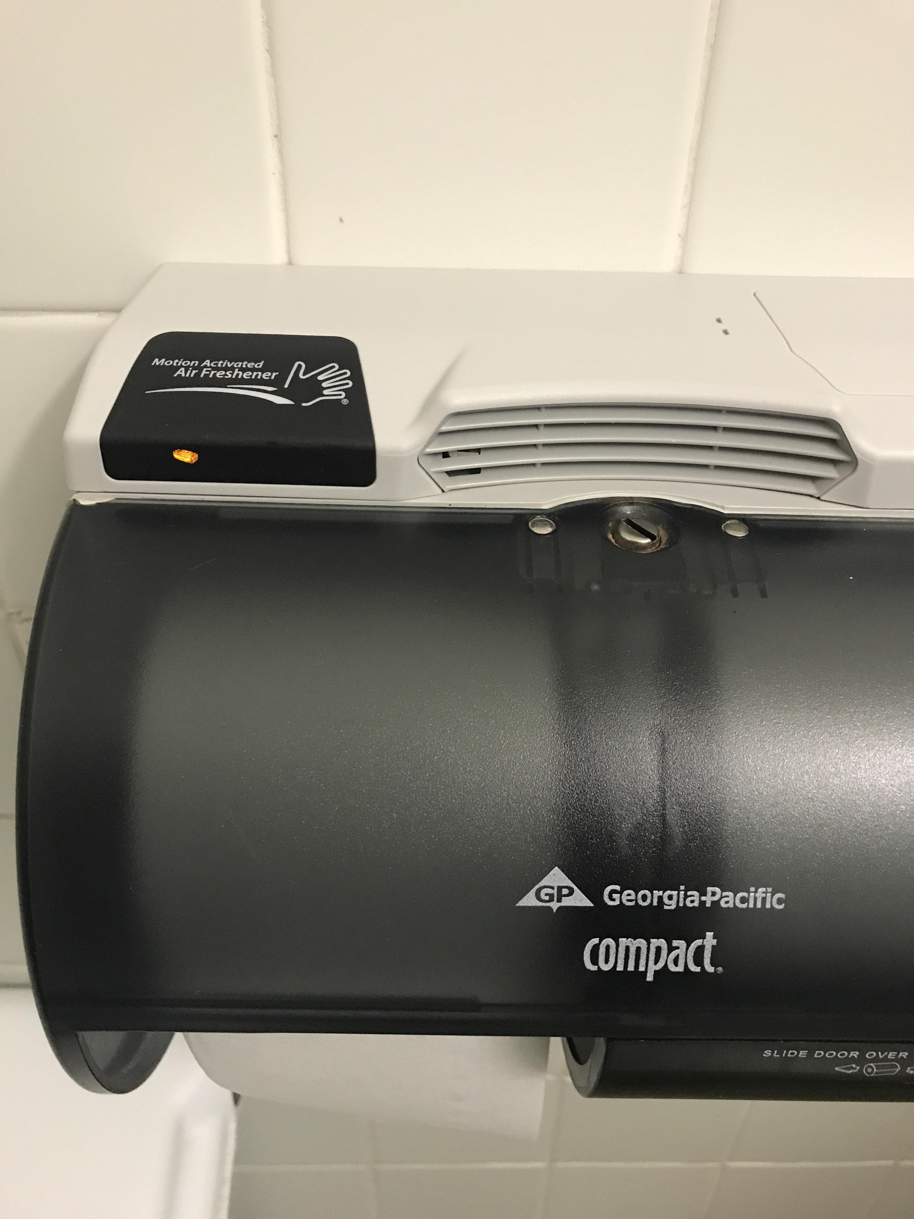 This toilet paper dispenser has a built in air freshener r