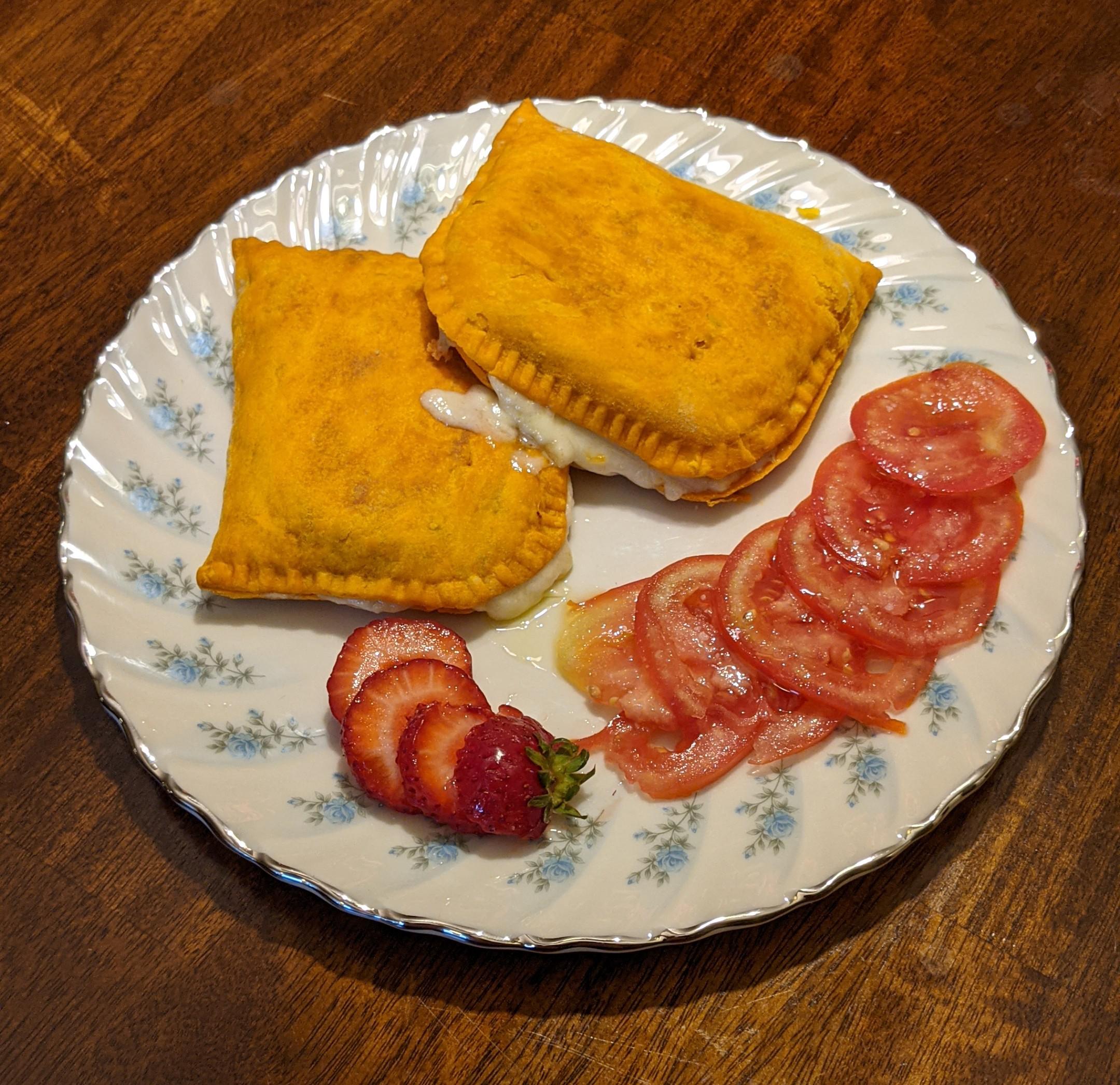 Tower Isles Jamaican beef patties with cheddar and tomatoes from the