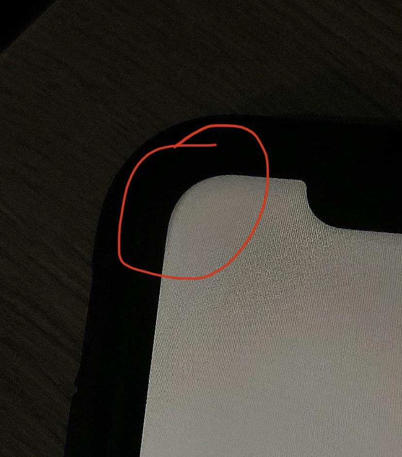 My iPhone 11 has a small shadow on the top edge of the screen. It's