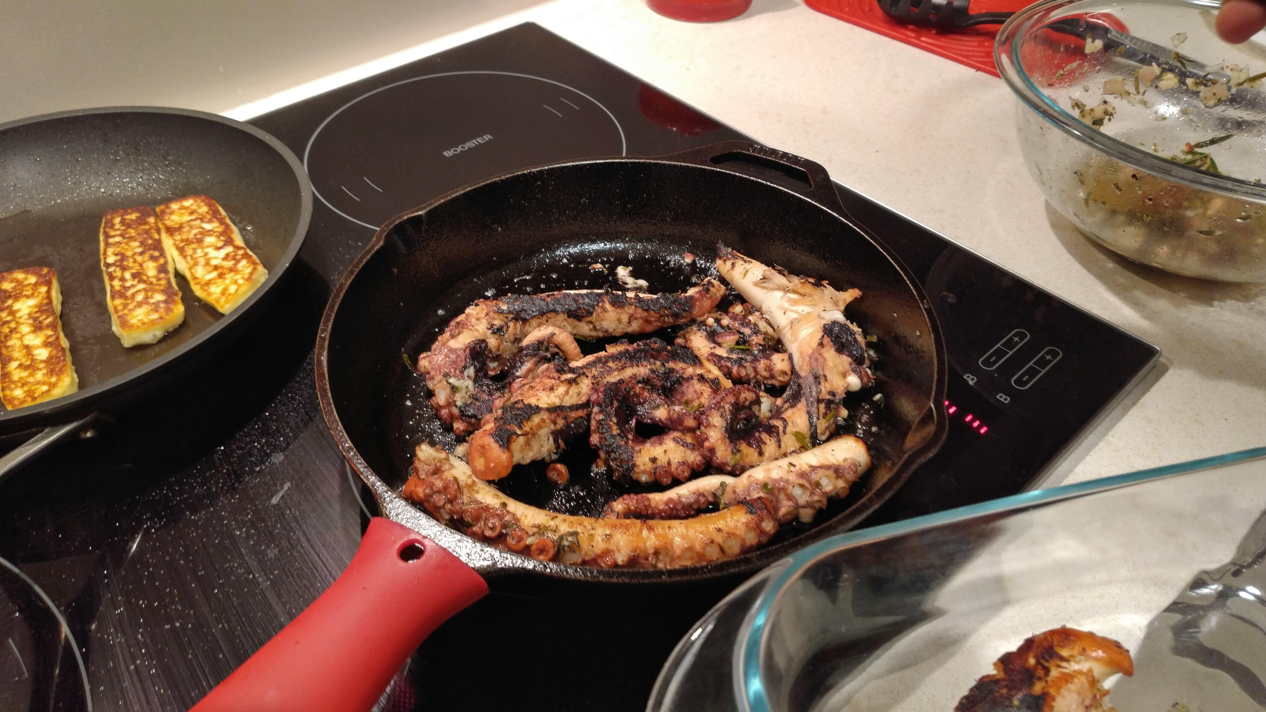 Octopus pressure cooked, then seared on cast iron. r/castiron