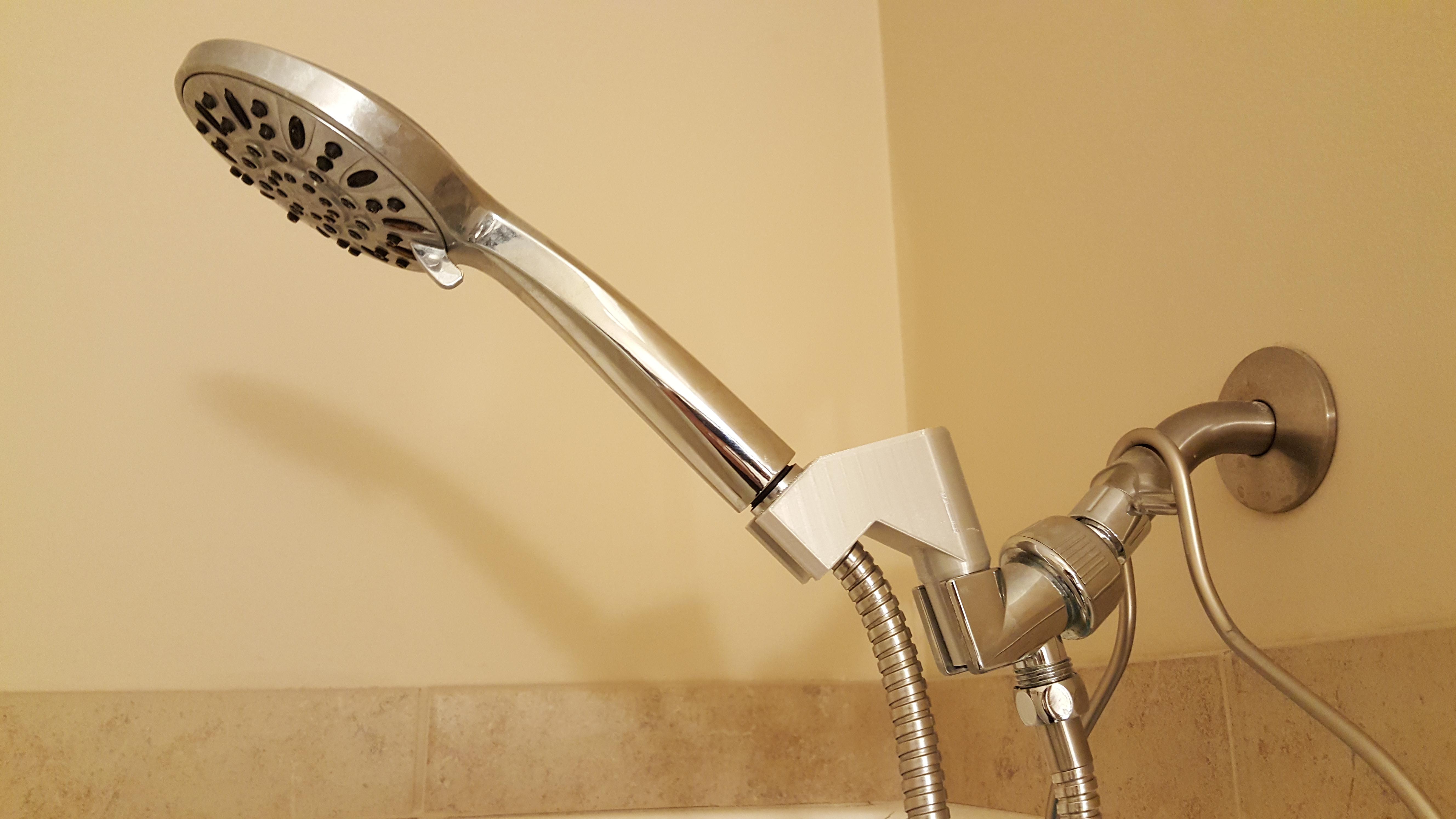 Shower head wand adapter to raise and change angle. Thingiverse in comments. r/functionalprint