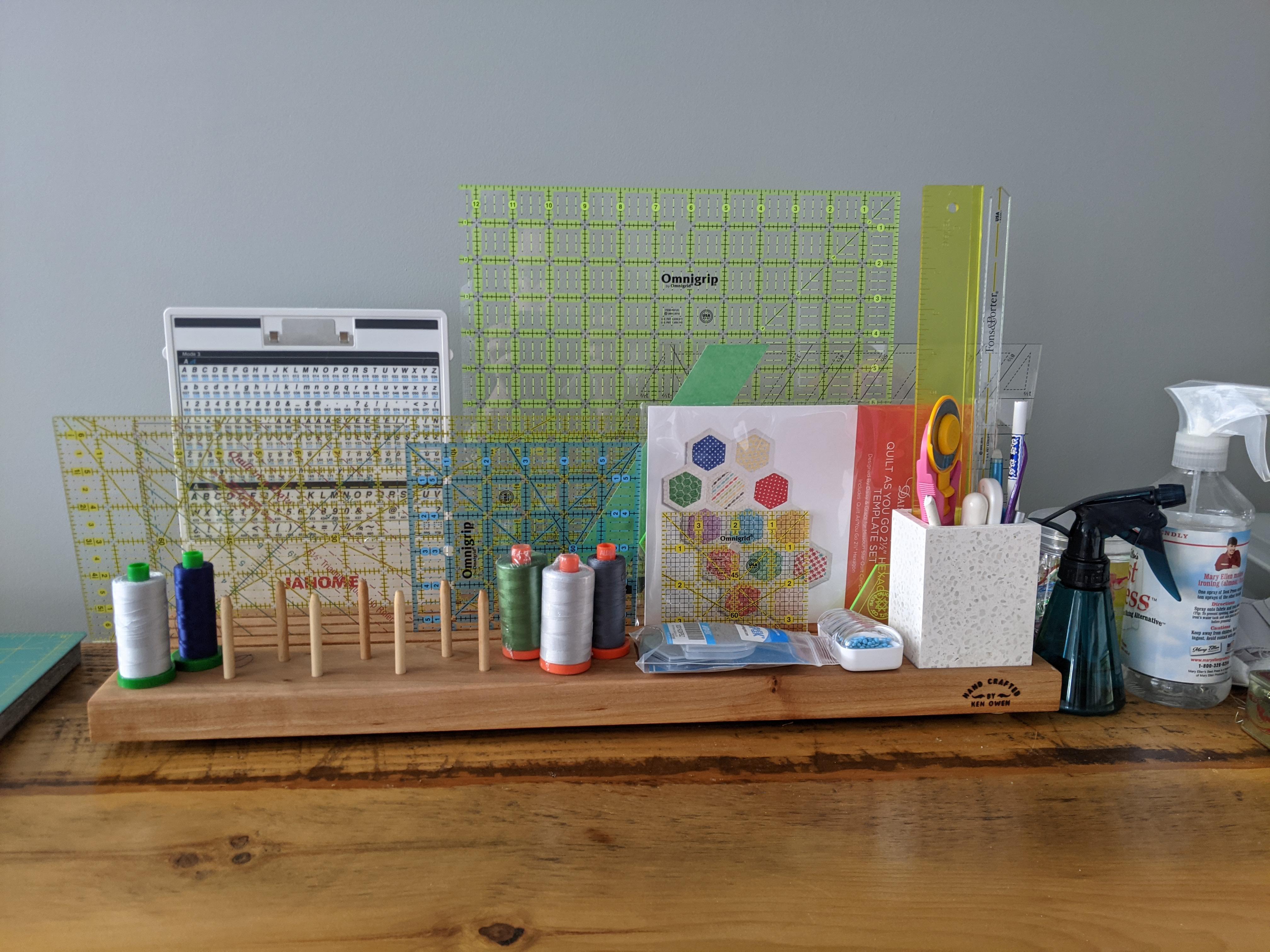 Thought you'd all appreciate the quilting supplies organizer my dad built me for Christmas. r