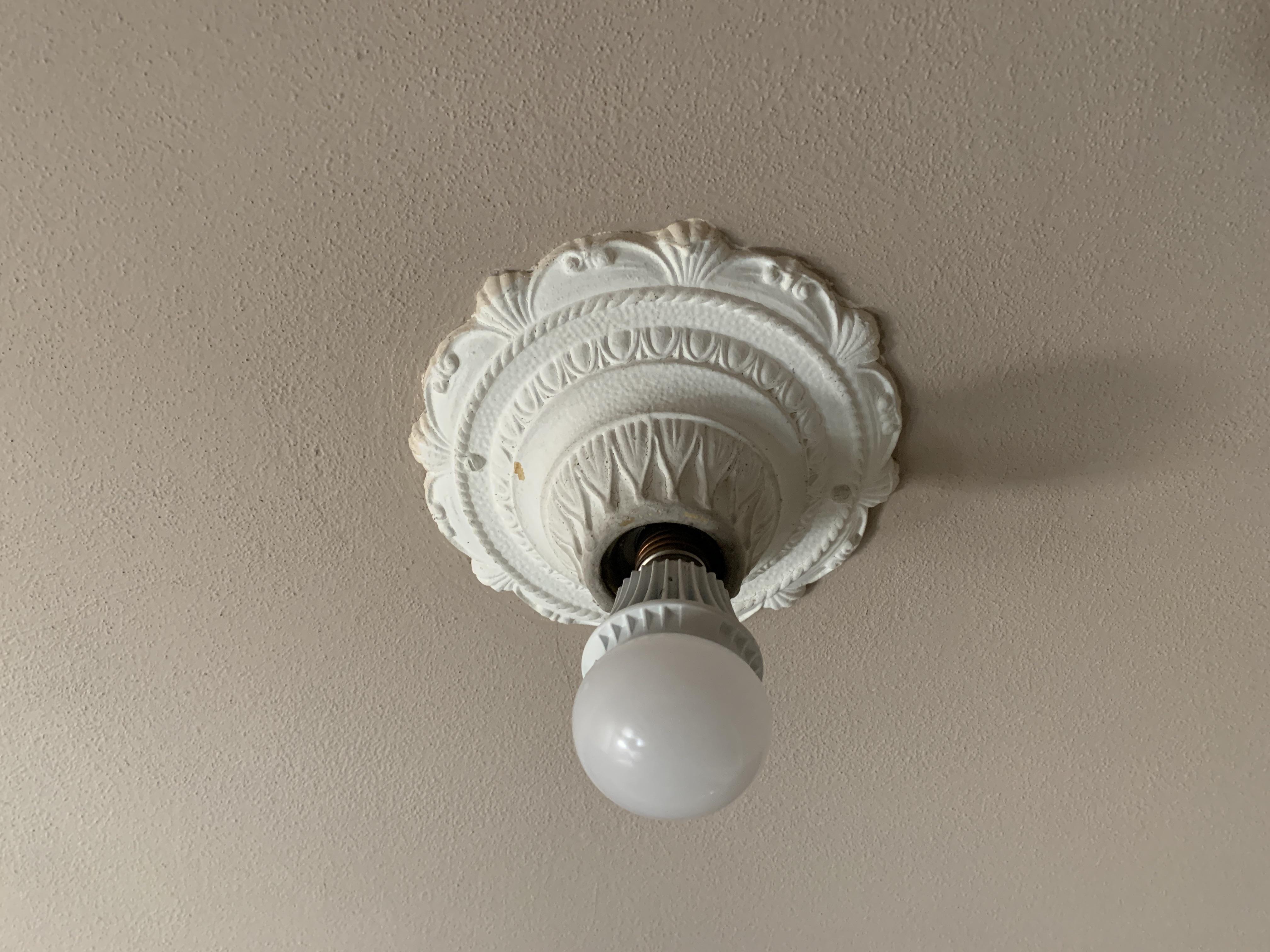I live in a 1910 house and the light fixture looked like this when I