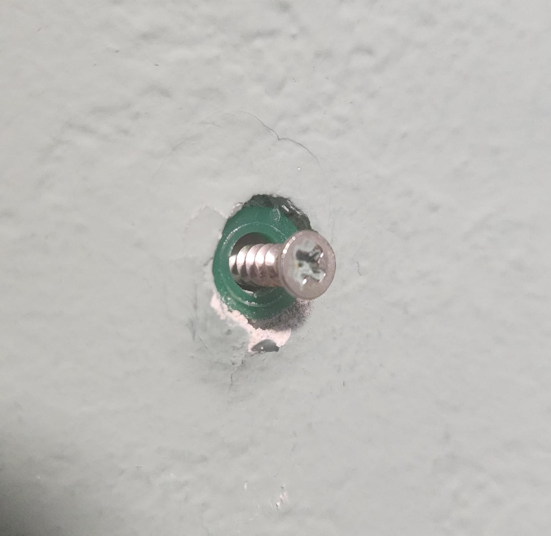 How do I fix the hole and reinforce the screw and anchor? hole is too
