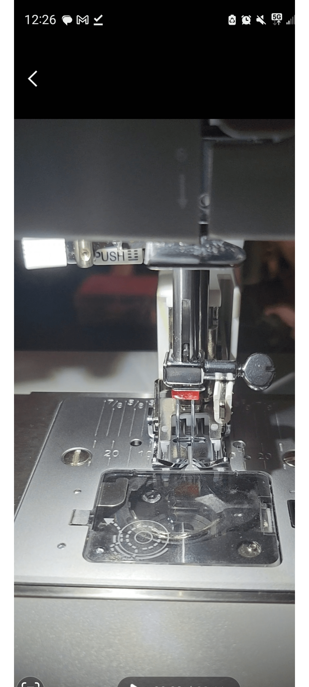 My Needle screw keeps hitting my walking foot r/sewing