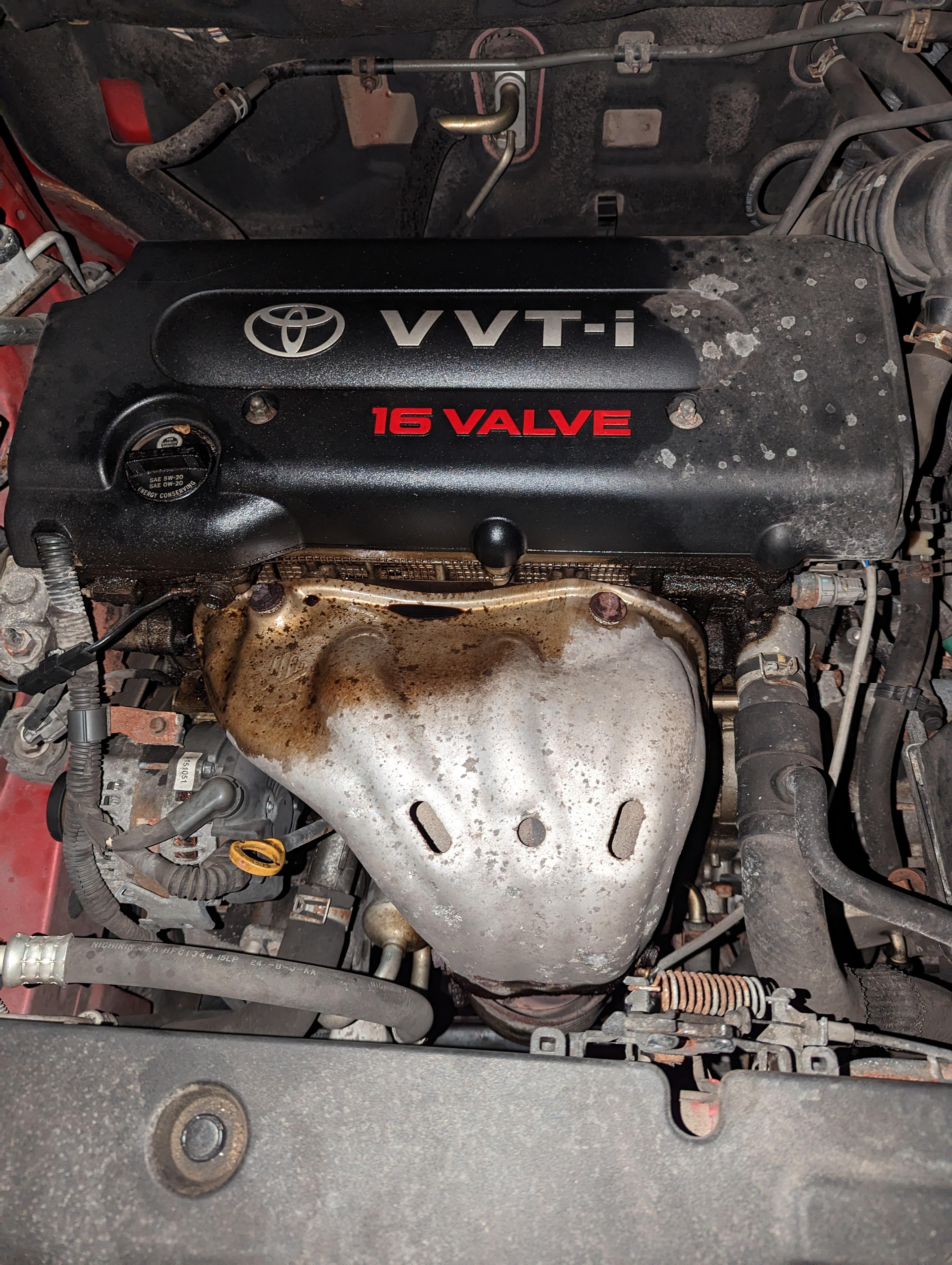 Car leaking oil it seems from the top with no warning lights. Is it