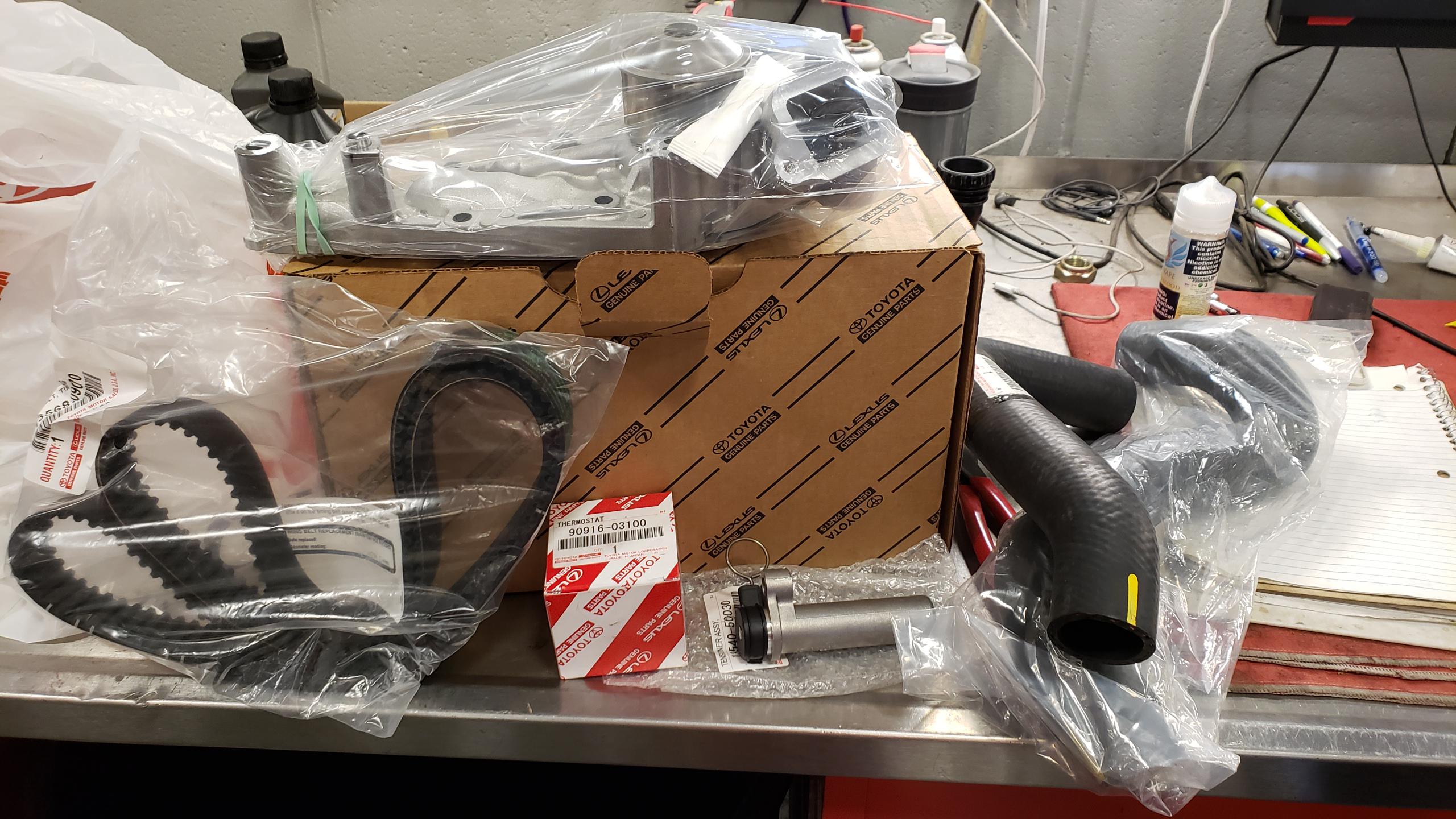 Timing belt,water pump, thermostat and hoses today. Factory parts for