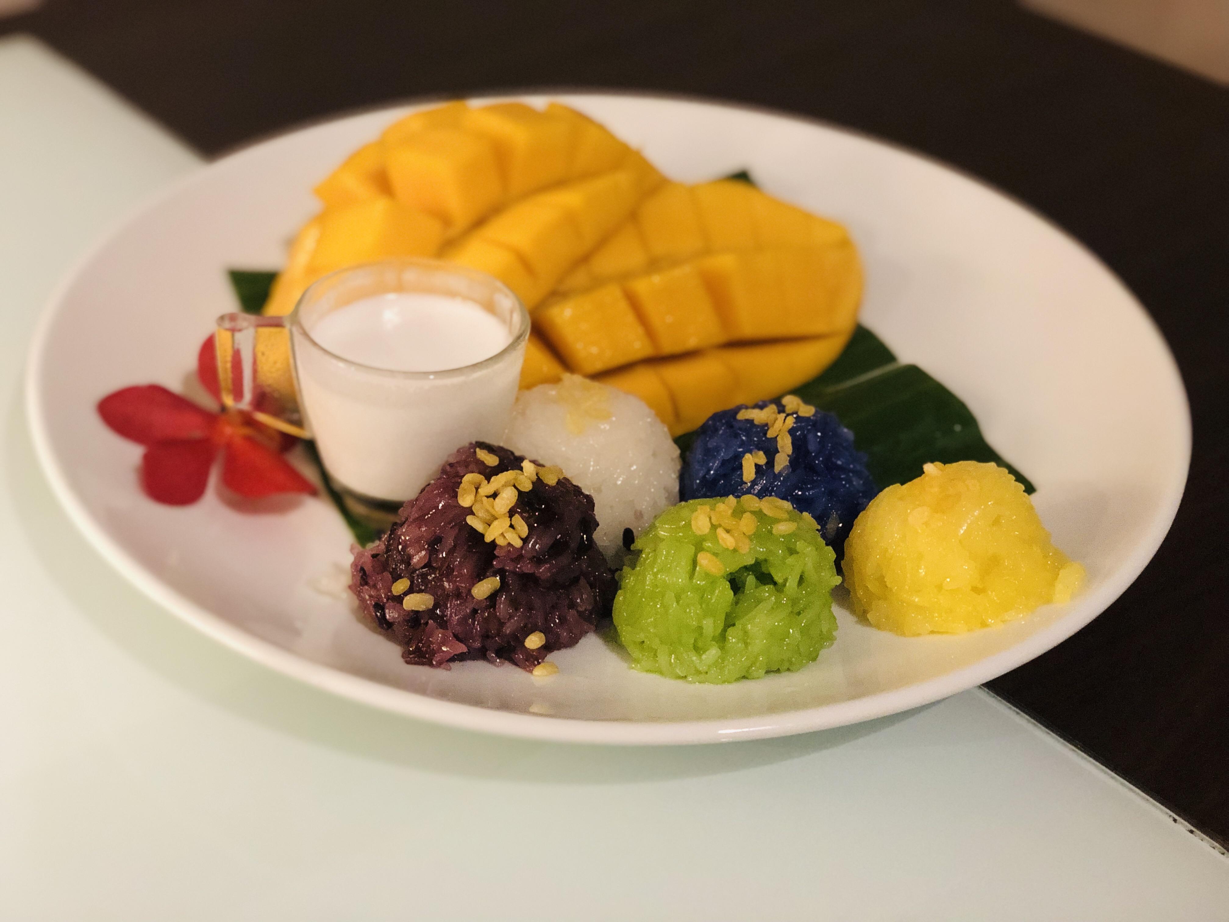 [I ate] Colorful Thai mango sticky rice with fresh mangoes and coconut