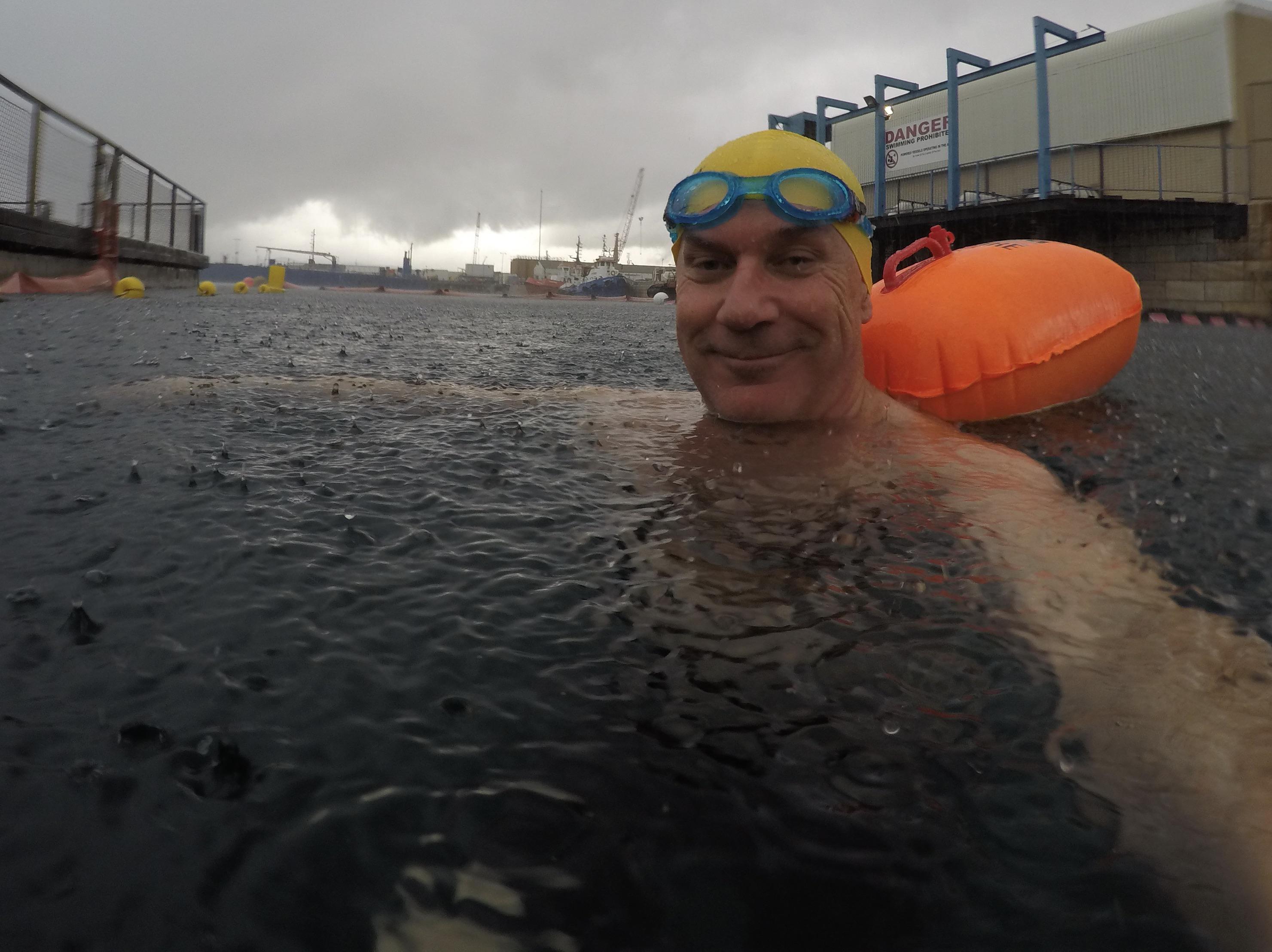 Swimming in the rain. r/OpenWaterSwimming