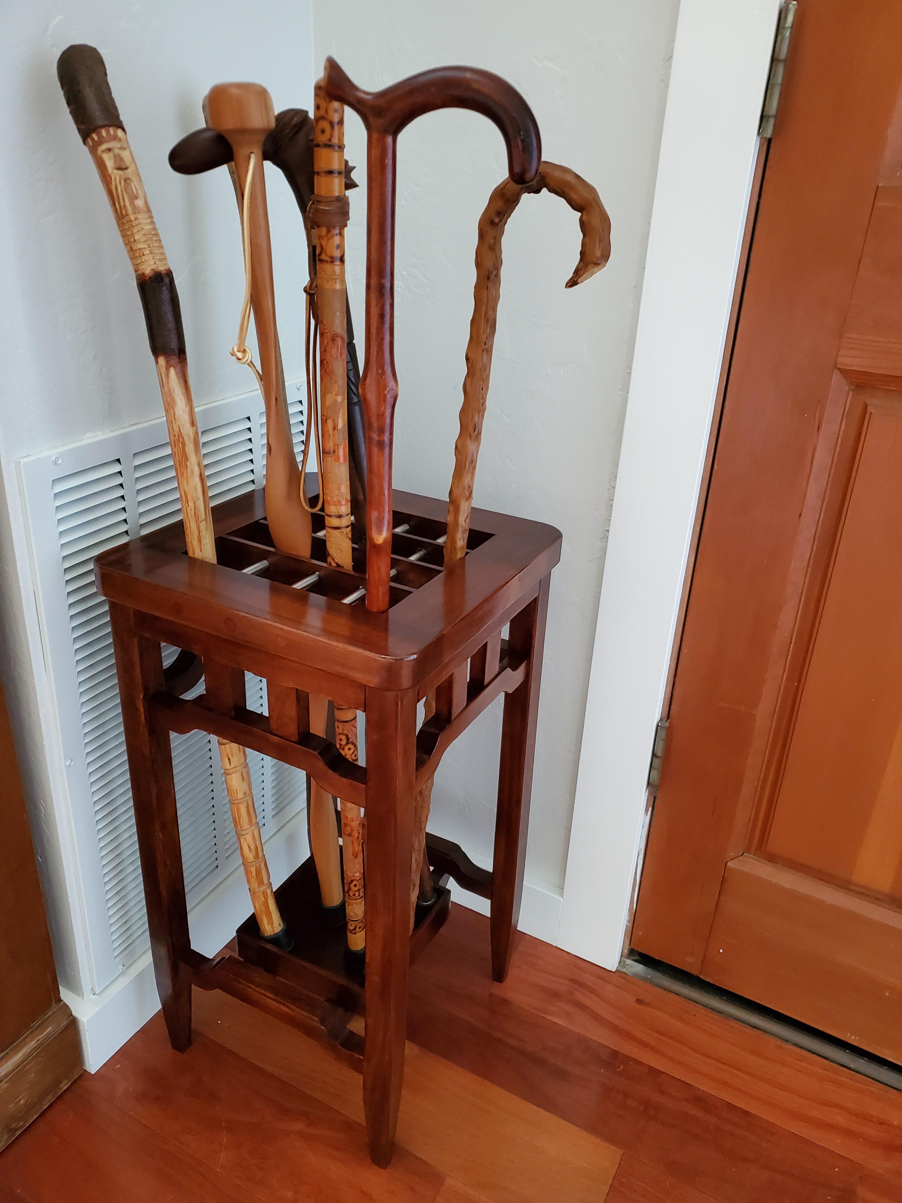 Walking stick stand made of Sapele Mahogany . I used black dye mixed with lacquer to darken it