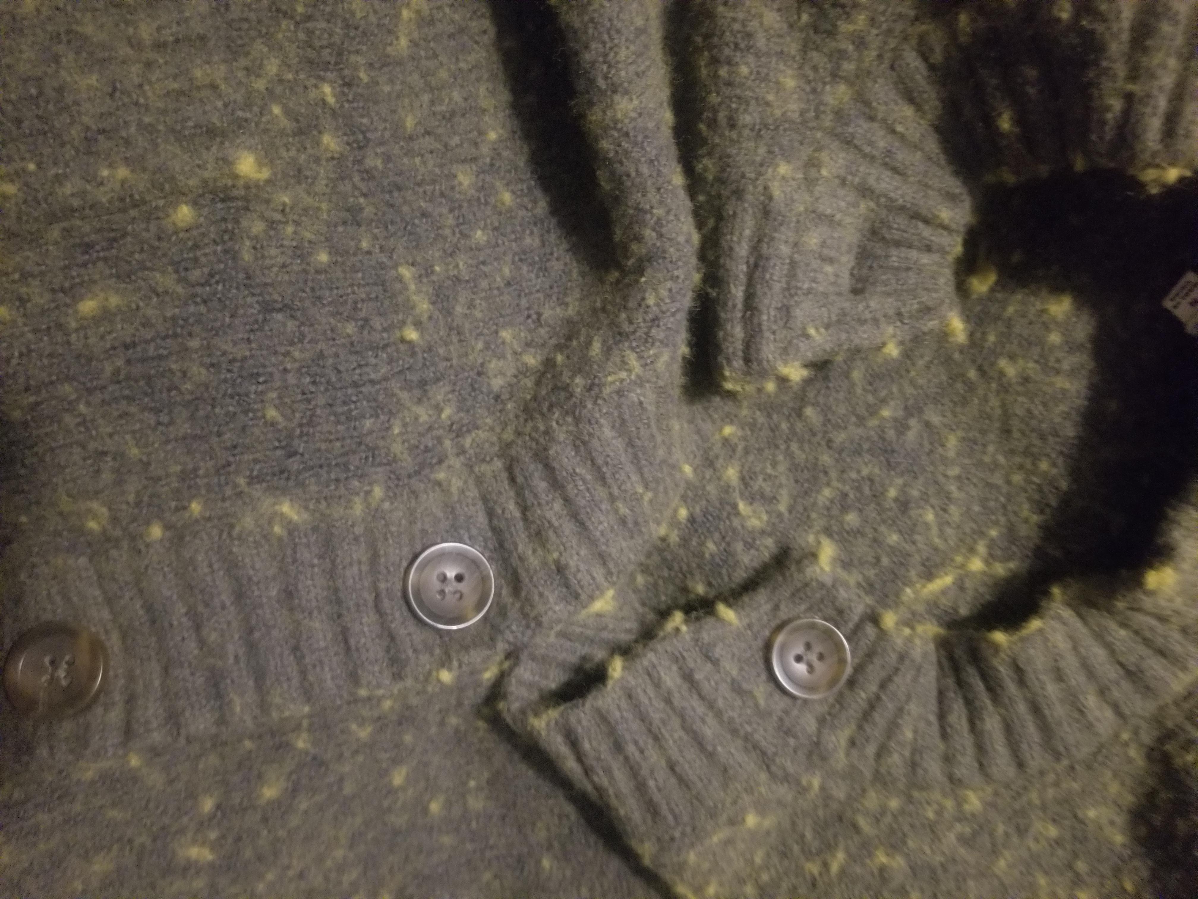 Can a dry cleaner fix this? Accidently washed this green sweater with a
