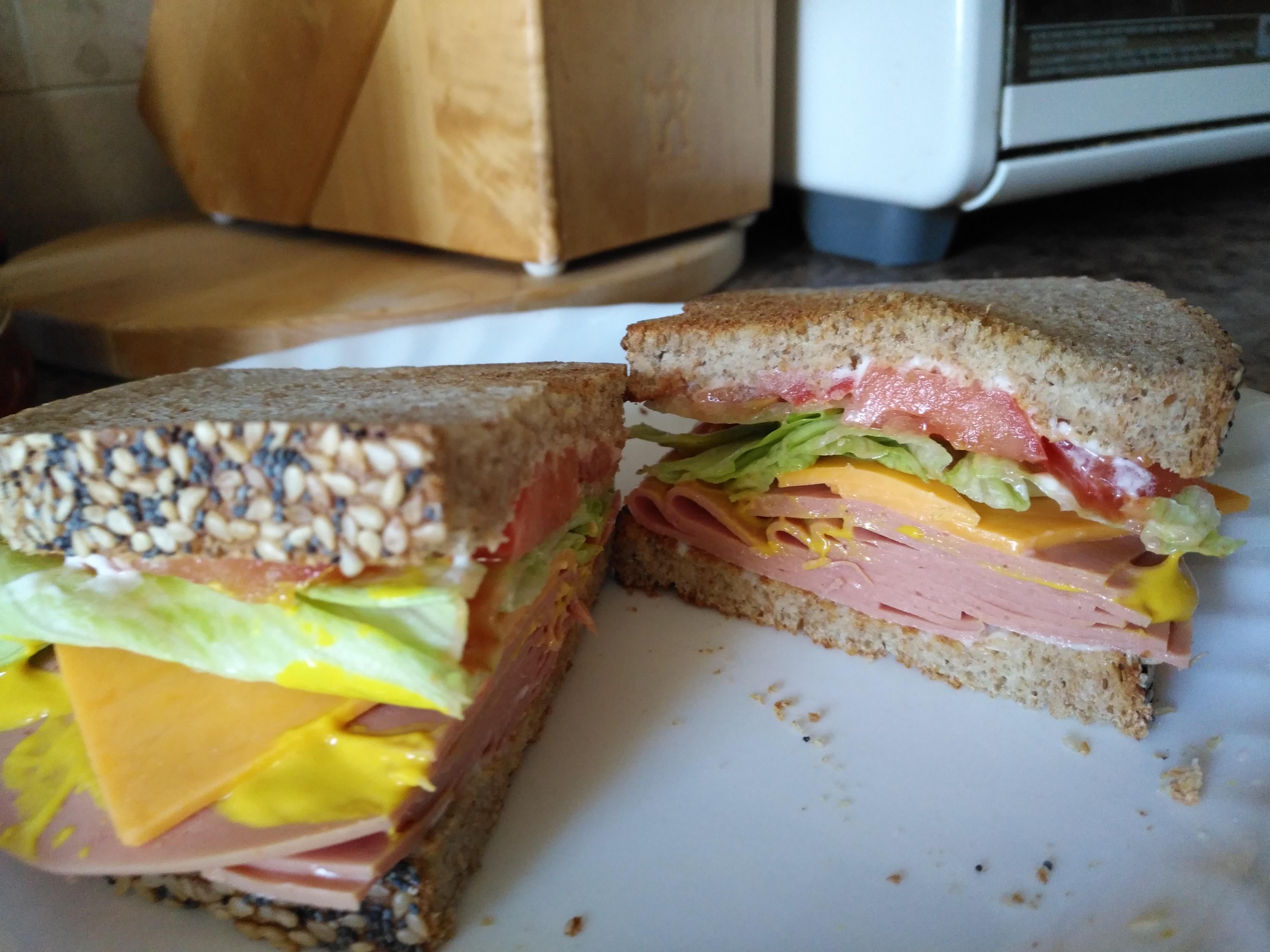 Baloney, cheddar, lettuce and tomato. With Mayo, mustard and ketchup