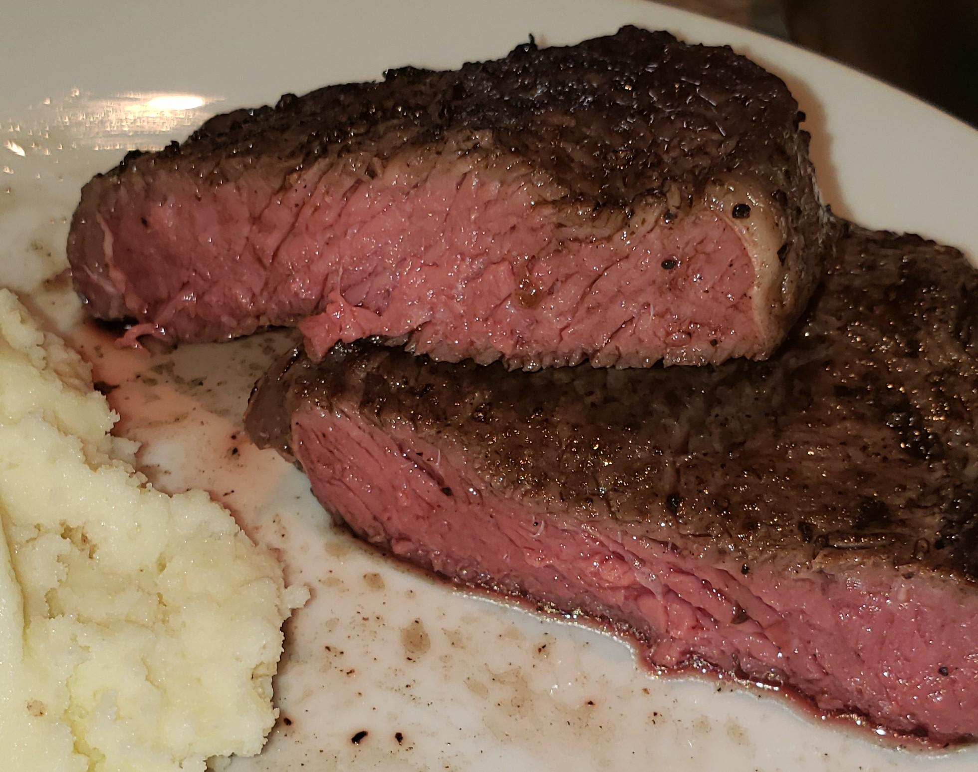 Ribeye steaks. One hour on the sous vide, then seared on a skillet over