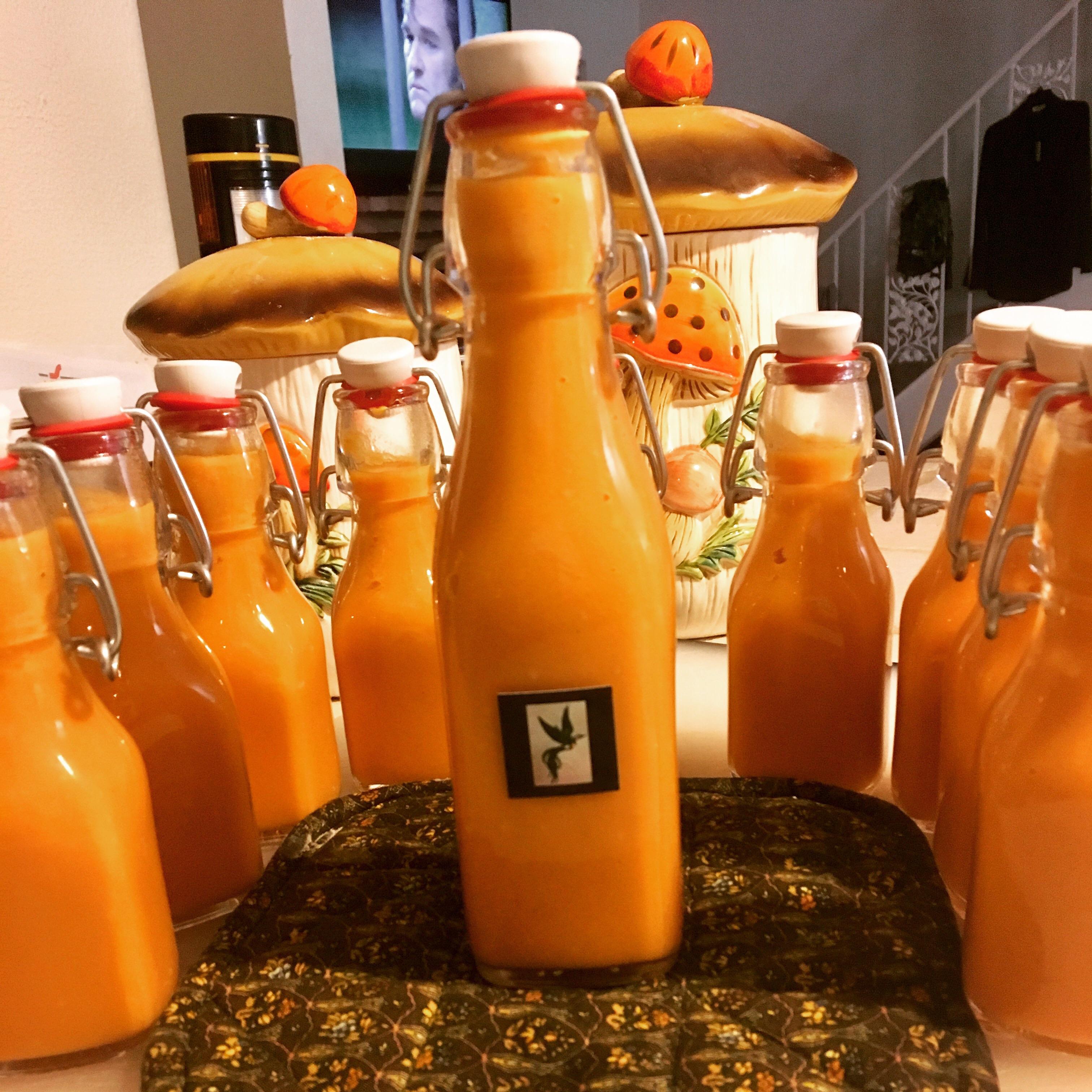 [Homemade] Habanero Chile Sauce finishes bottling these beauties. r/spicy
