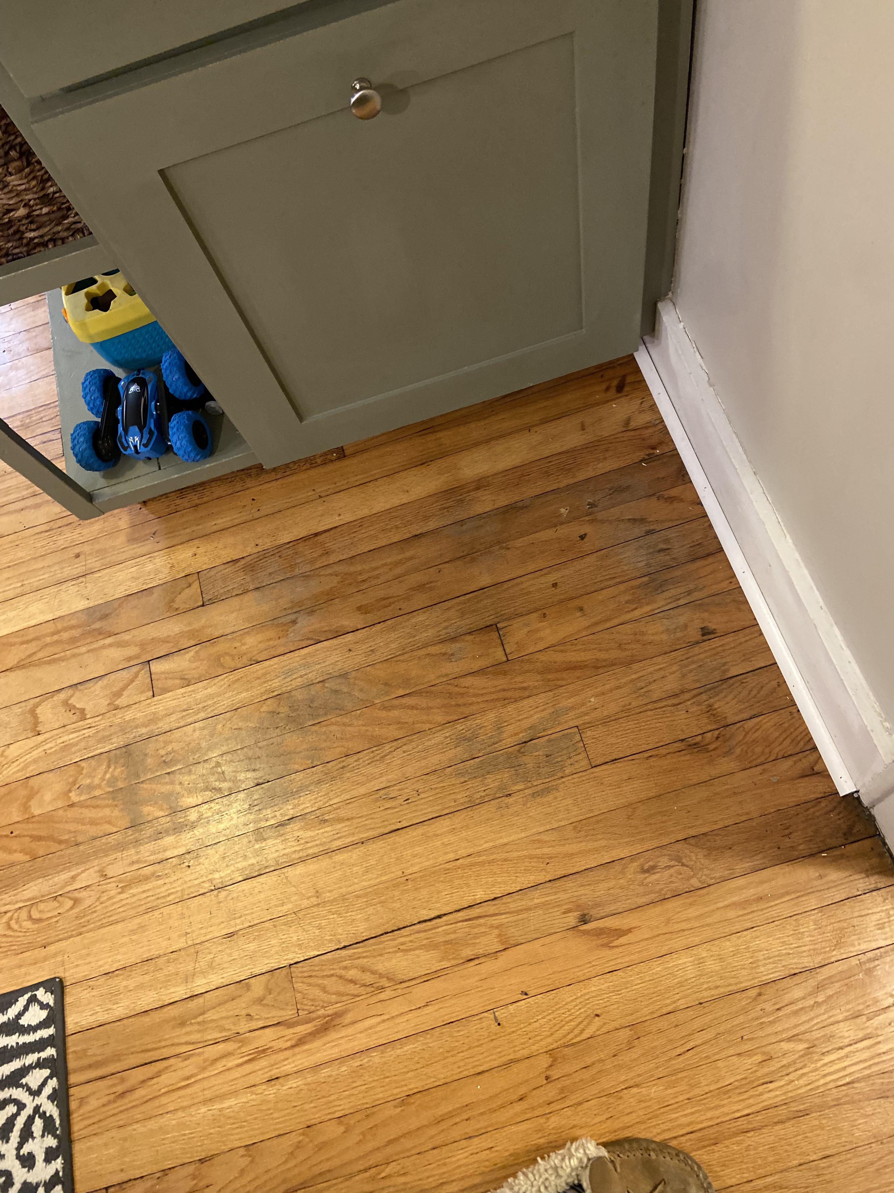 Is there anyway to improve the worn grey spots on my hardwood floor