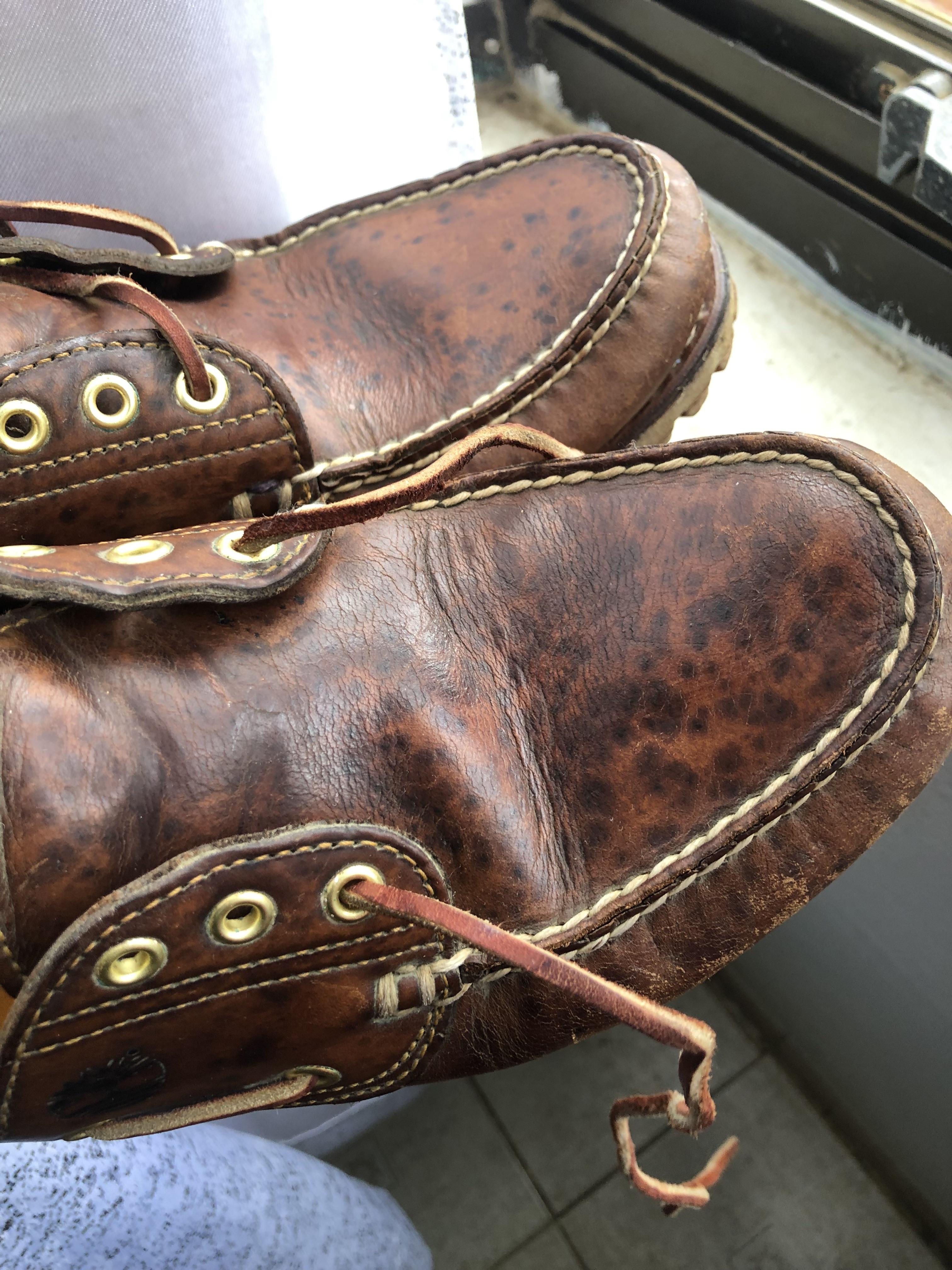 can anyone help me remove this black stain on leather shoes? r