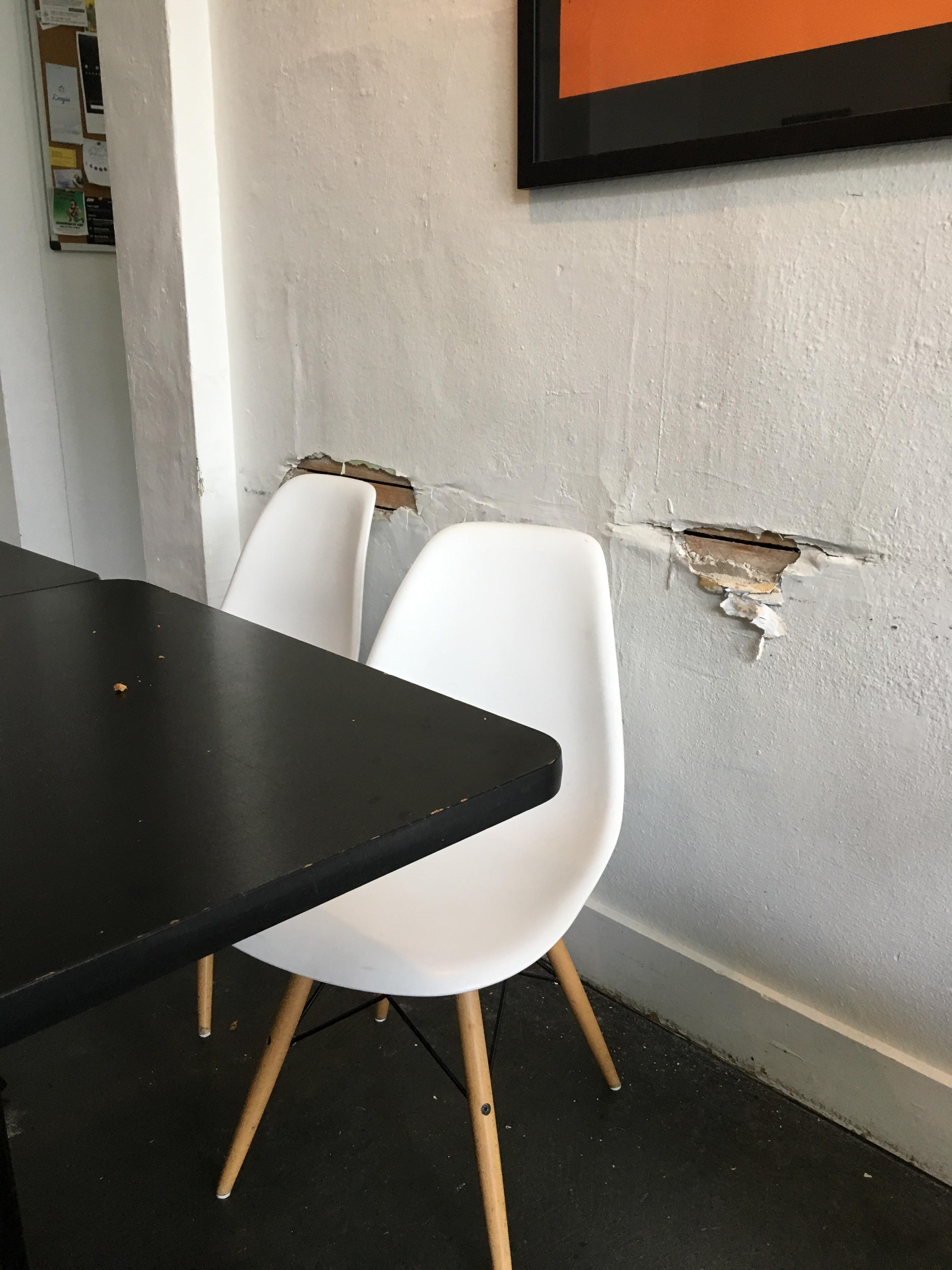 The wall behind these chairs in an old coffee shop r/Wellworn