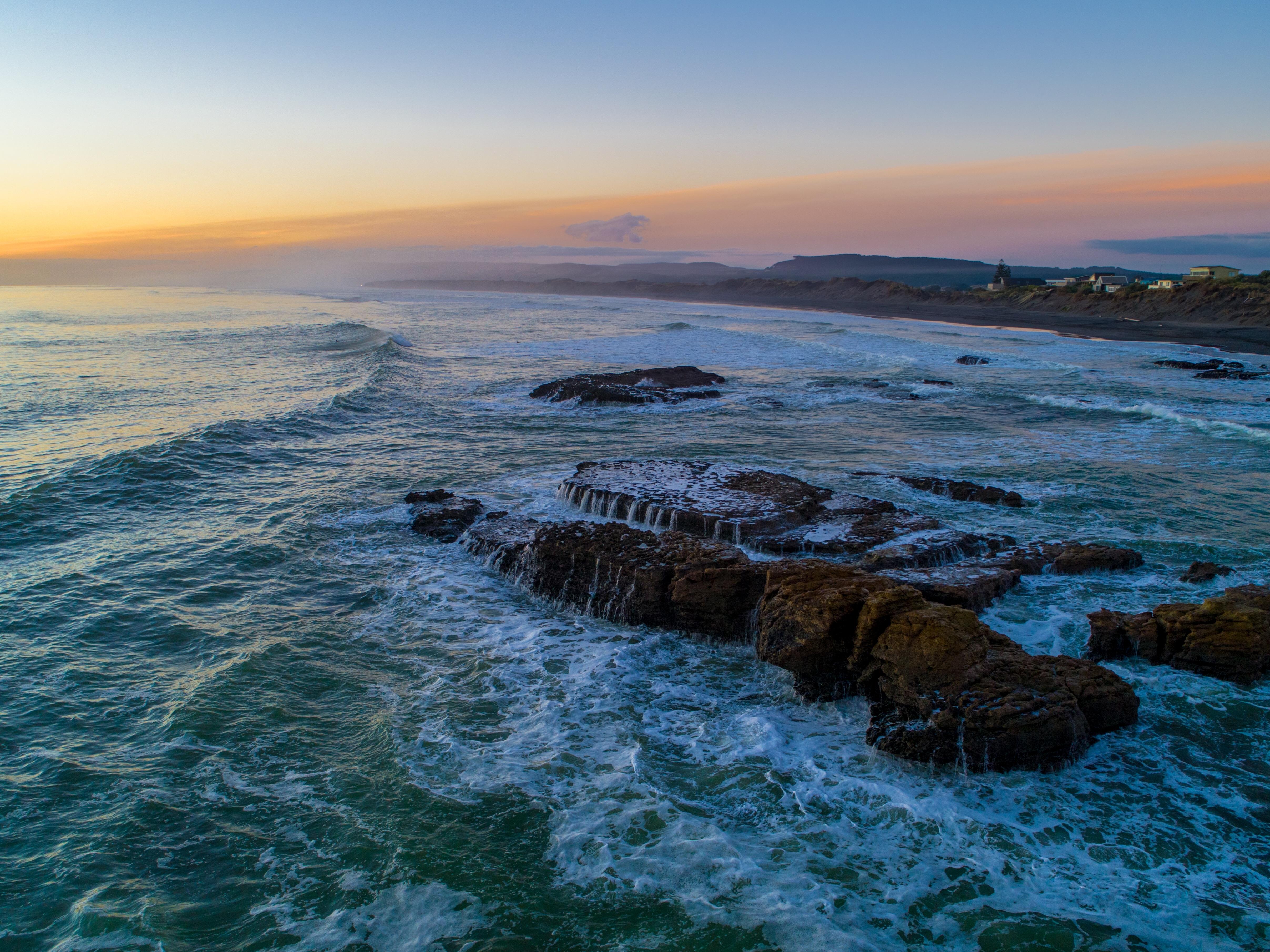 Winter sunset at Port Waikato New Zealand 🇳🇿 r/newzealand