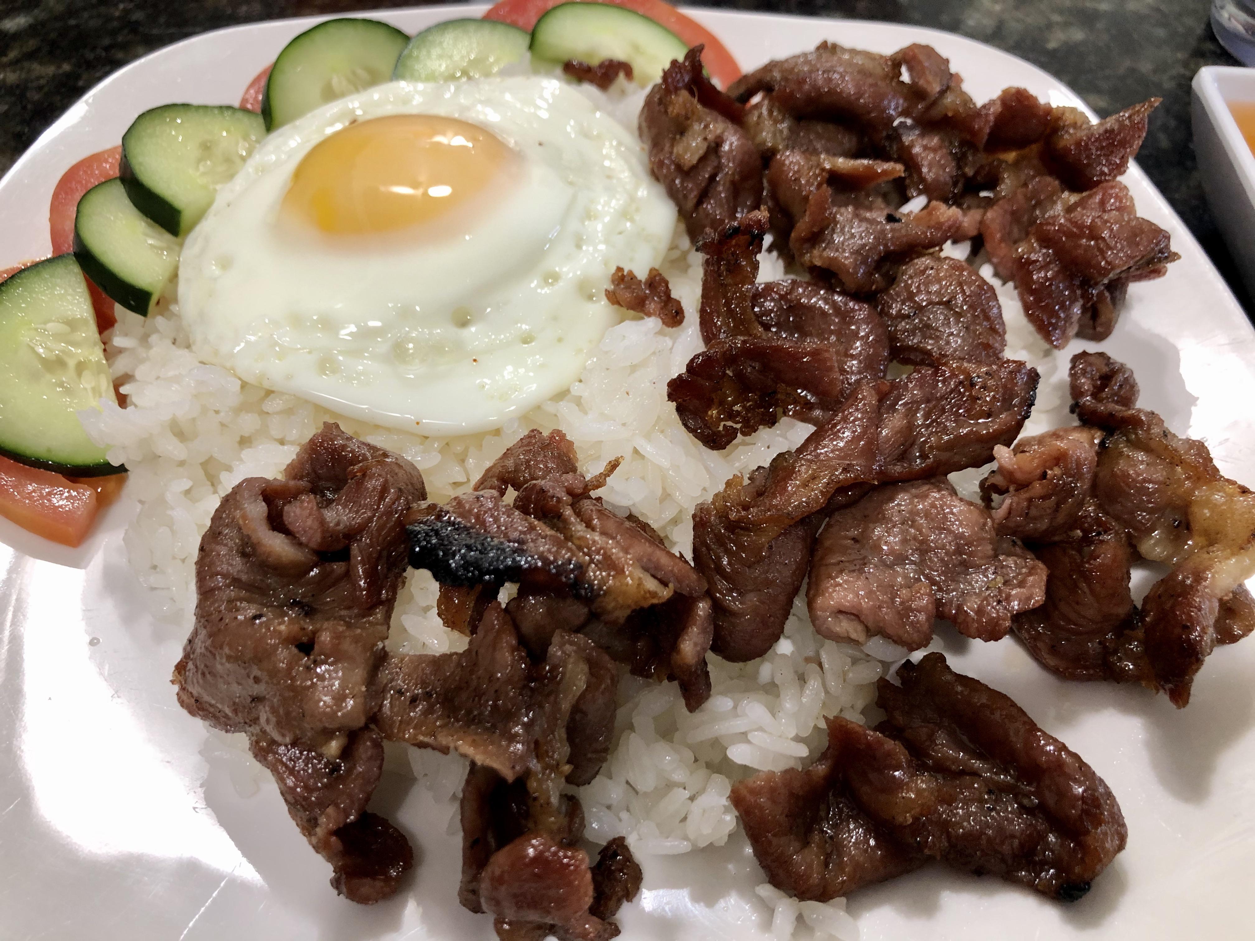 BBQ pork over rice with a sunny side up egg! r/FoodPorn