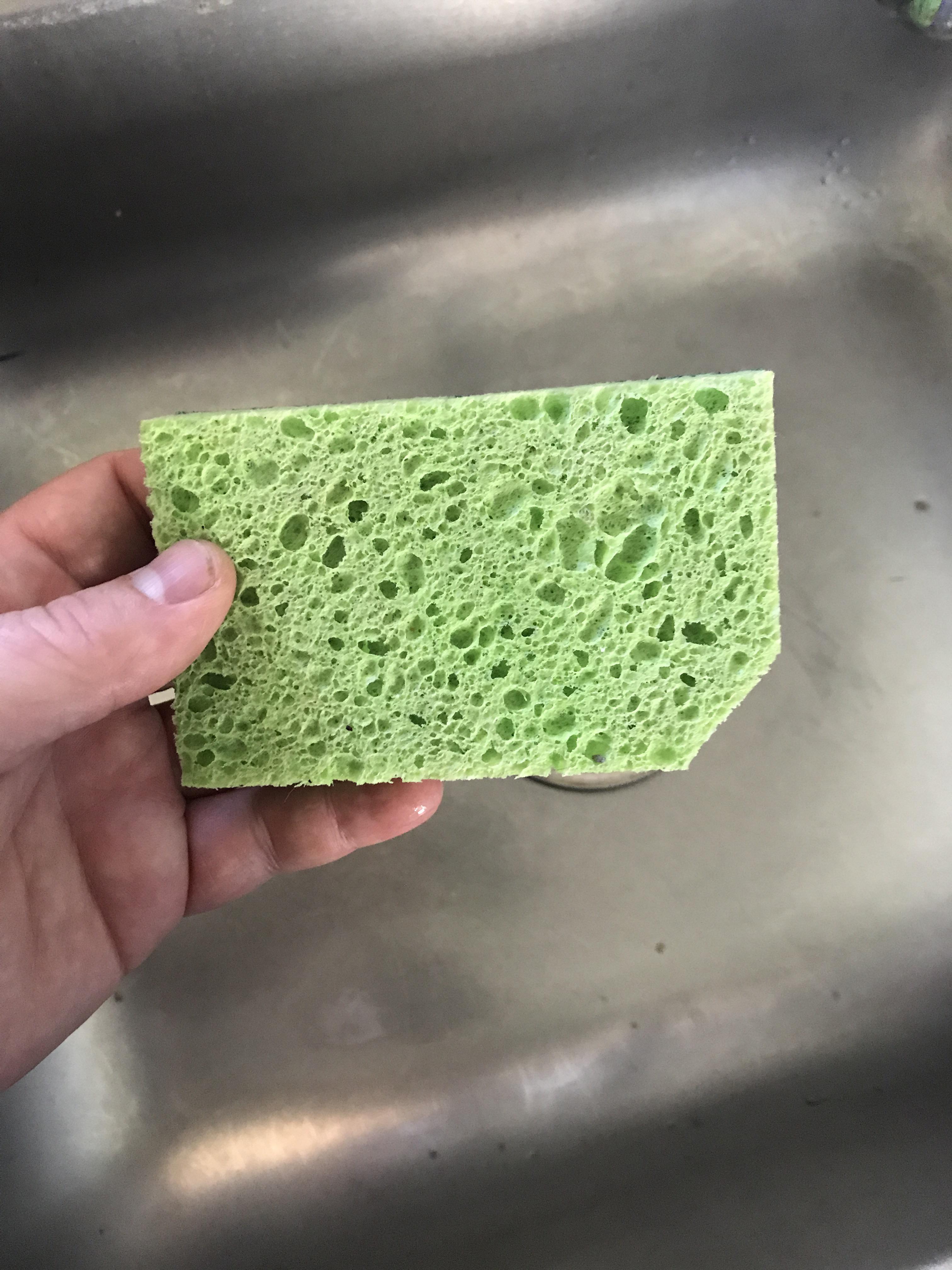 Cut one corner off of the sponge that you use for surfaces, so that it