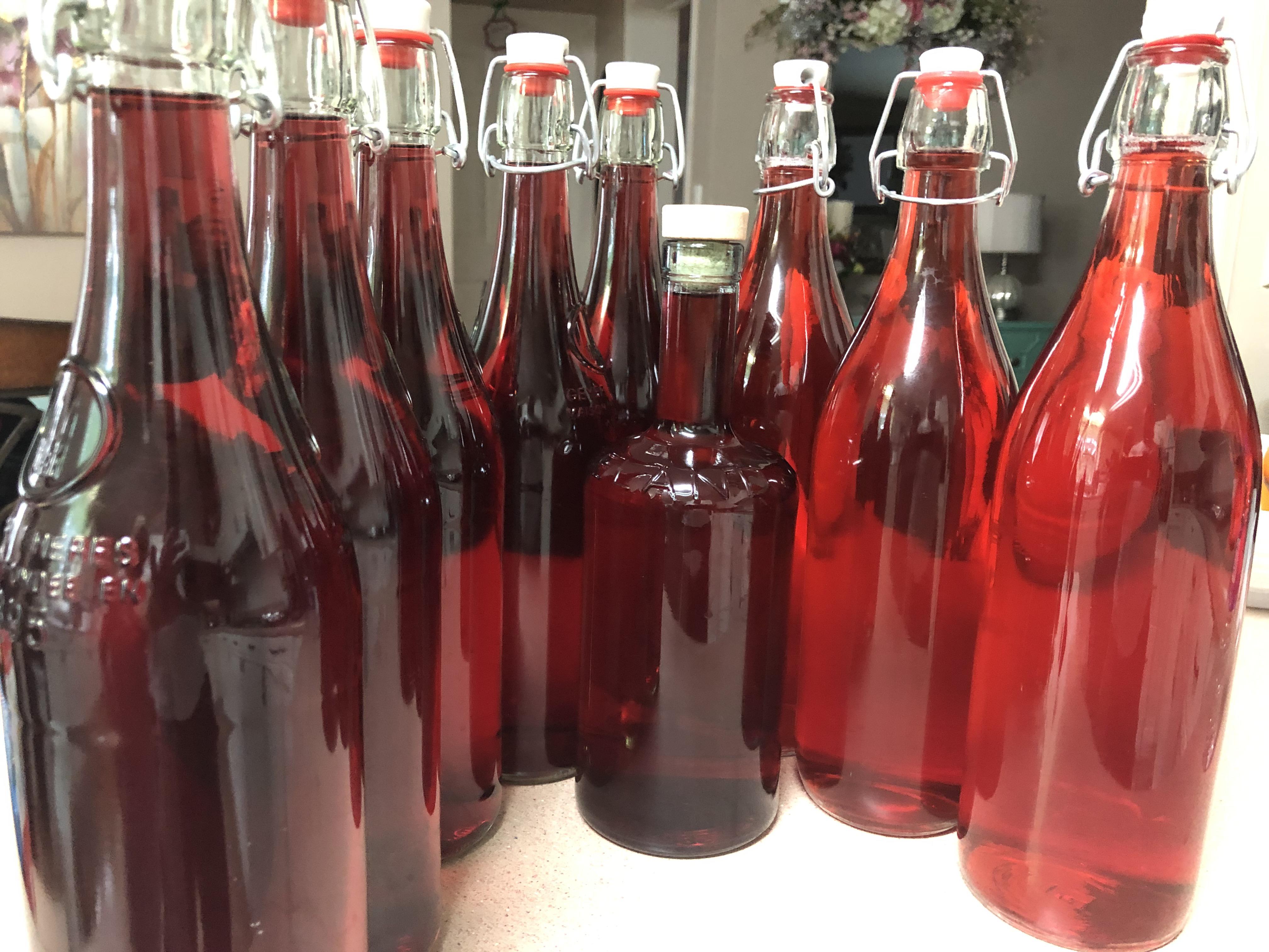 Bottling day. Raspberry Mead on the right & center along with some