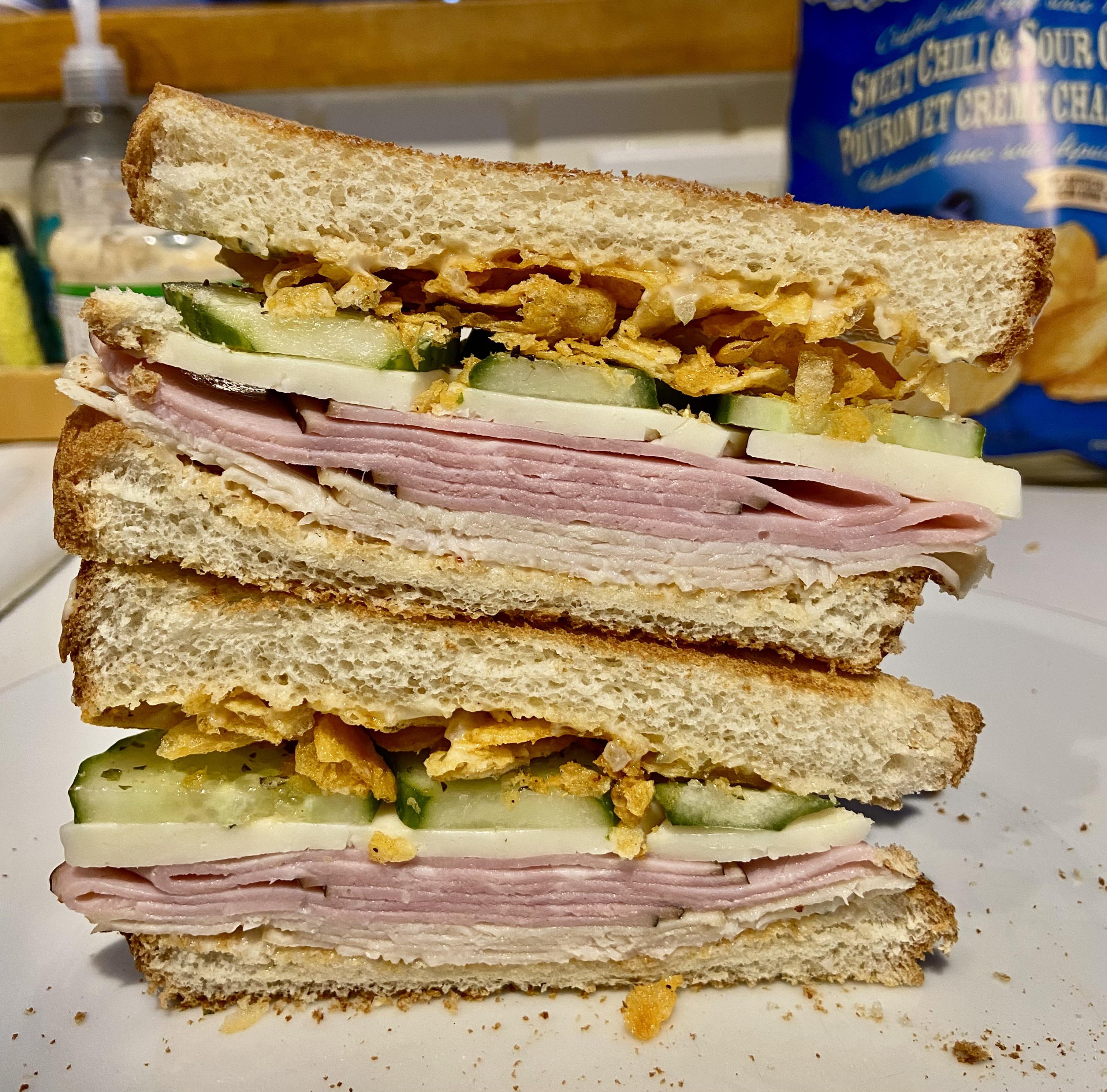 Simple turkey+ham, havarti, cukes, and chips with relish mayo r/eatsandwiches