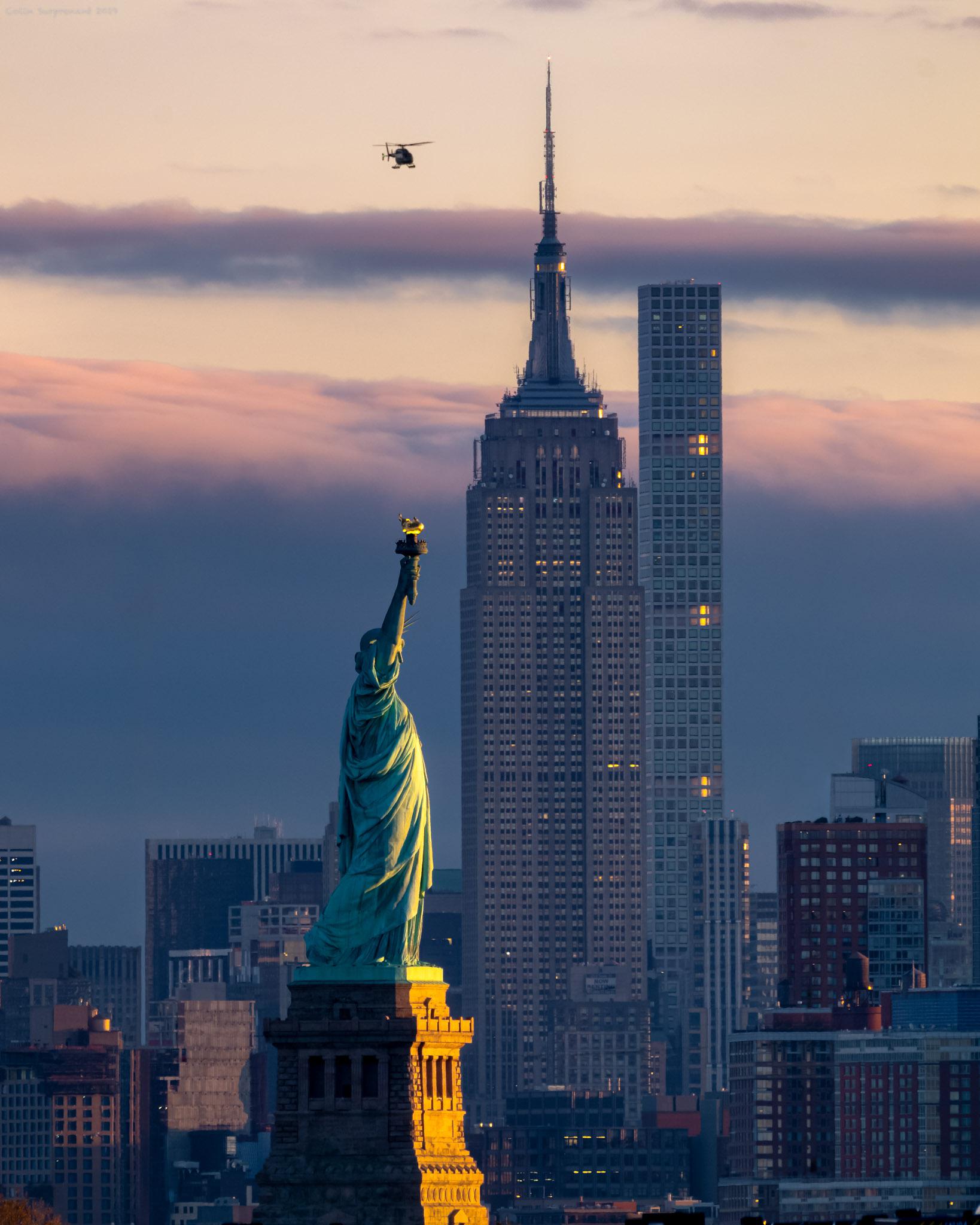 Sunrise over Manhattan and the Statue of Liberty nyc