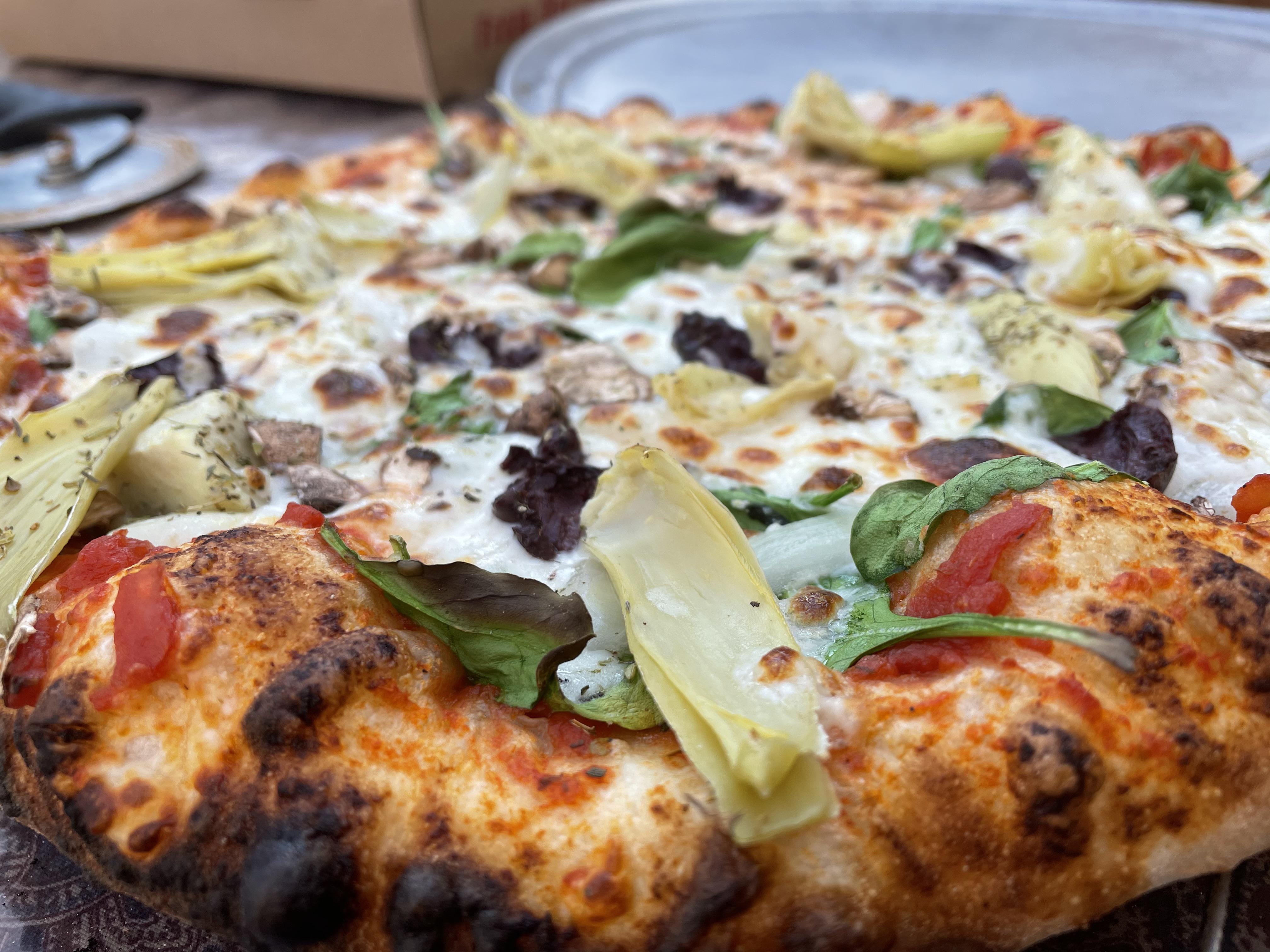 Wood fire pizza, Bucks Pizza of Crestone Colorado. r/pizzaoven