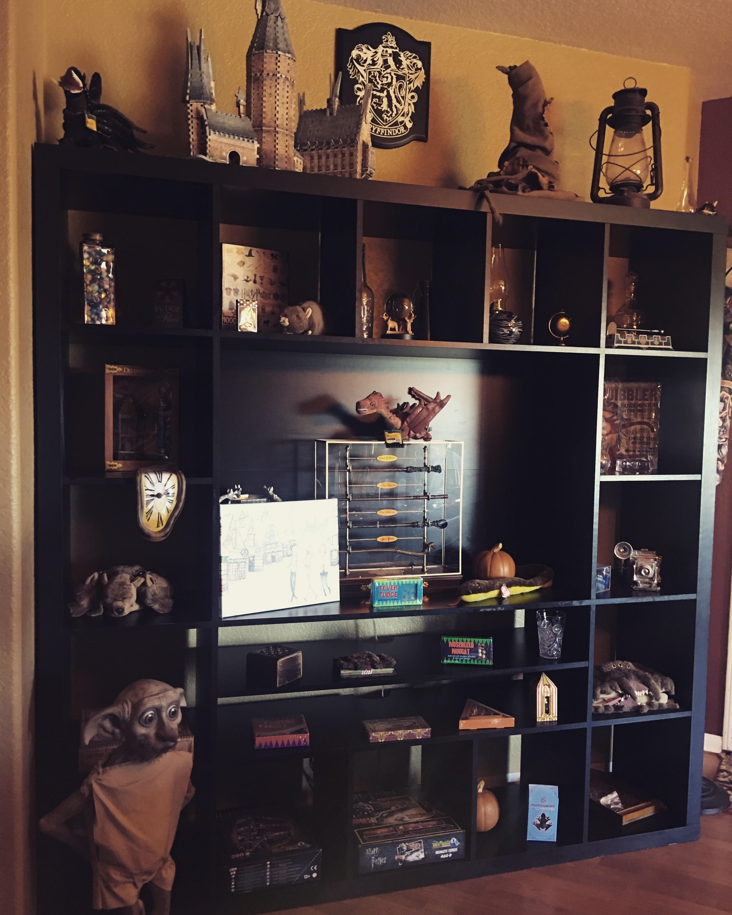 Bookcase in my Harry Potter themed dining room. r/harrypotter