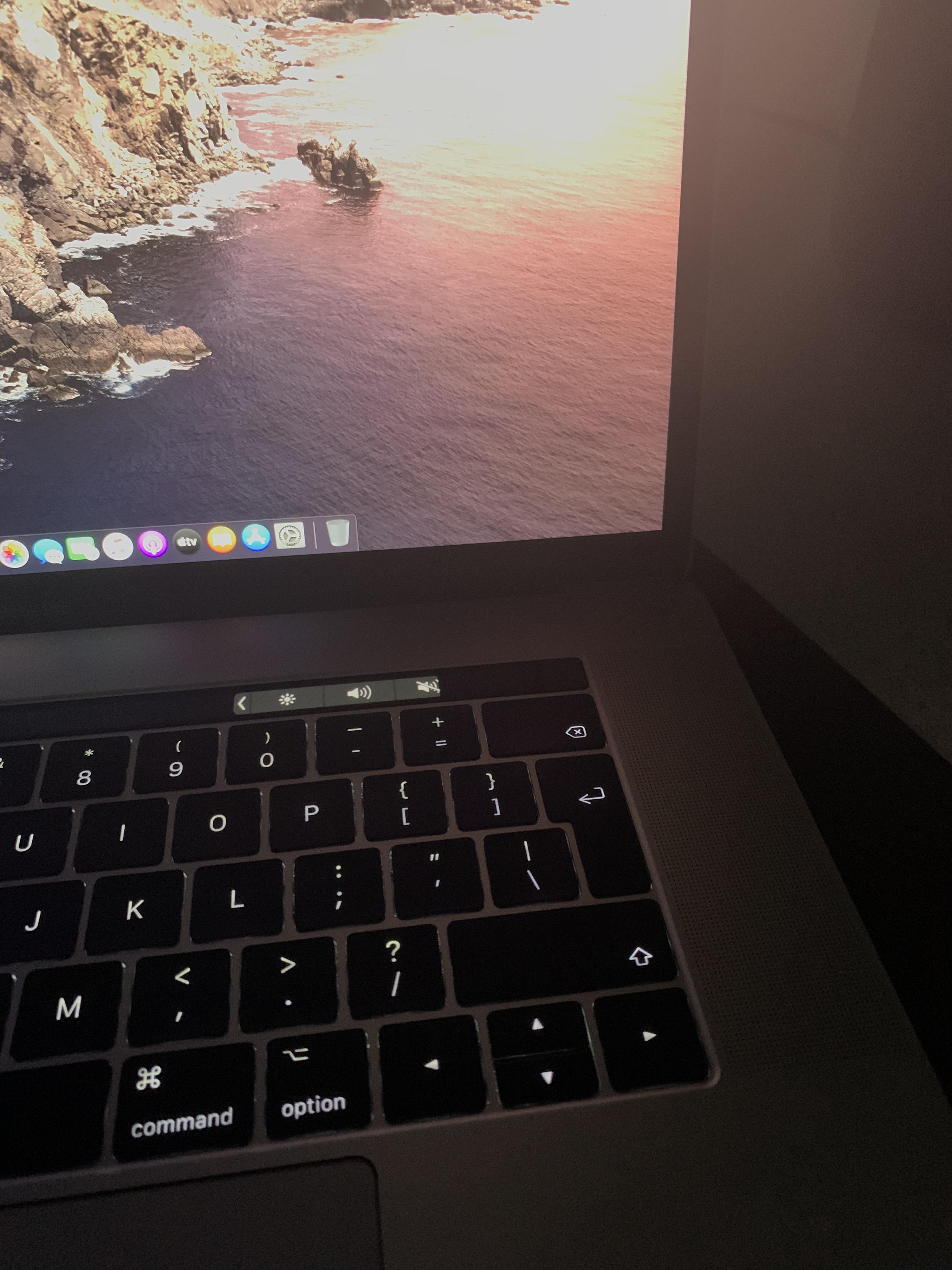 Touchbar black in the corner what I should do ? r/macbookpro