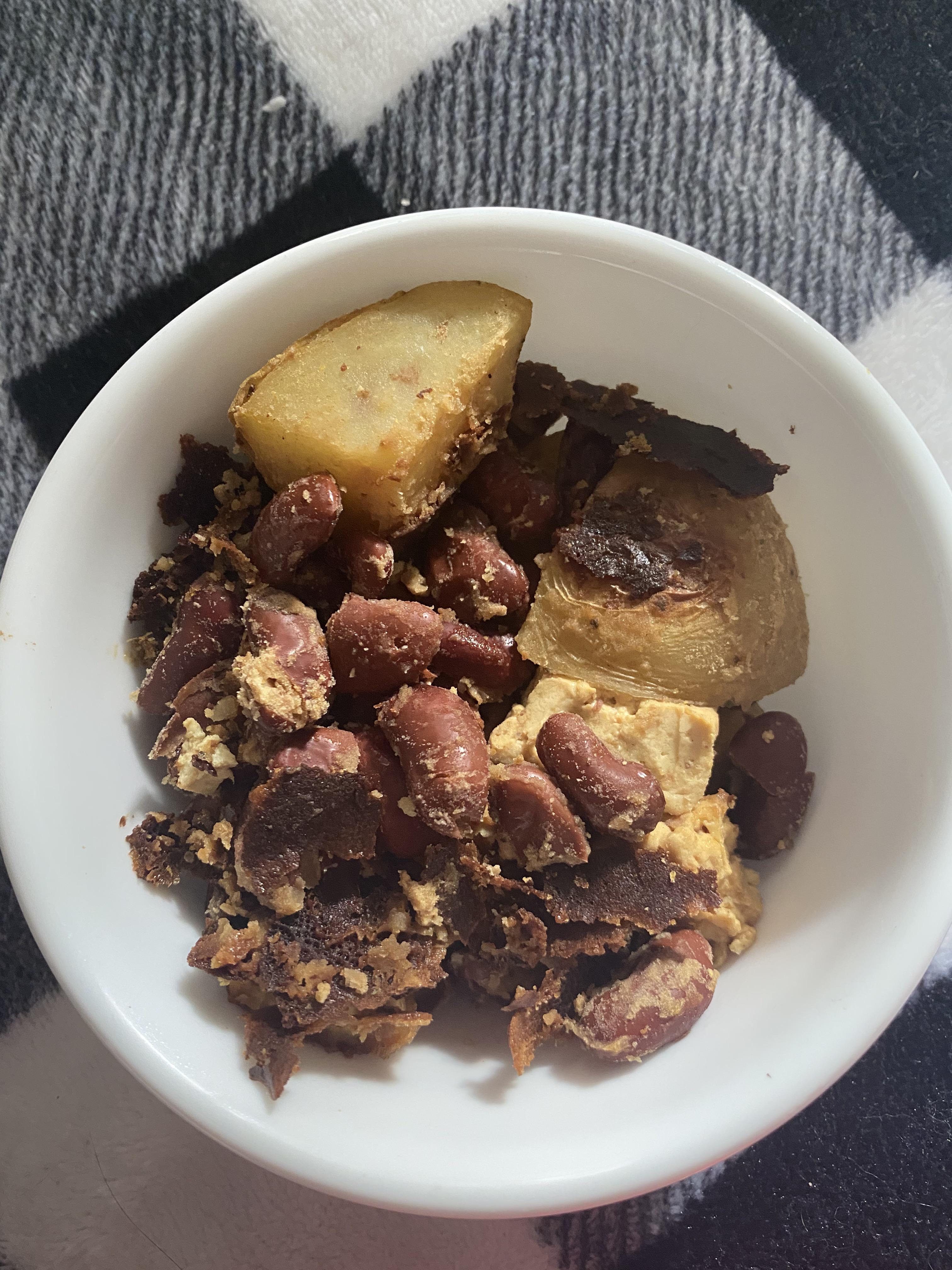 Overcooked kidney beans, tofu, and potatoes that i threw in the