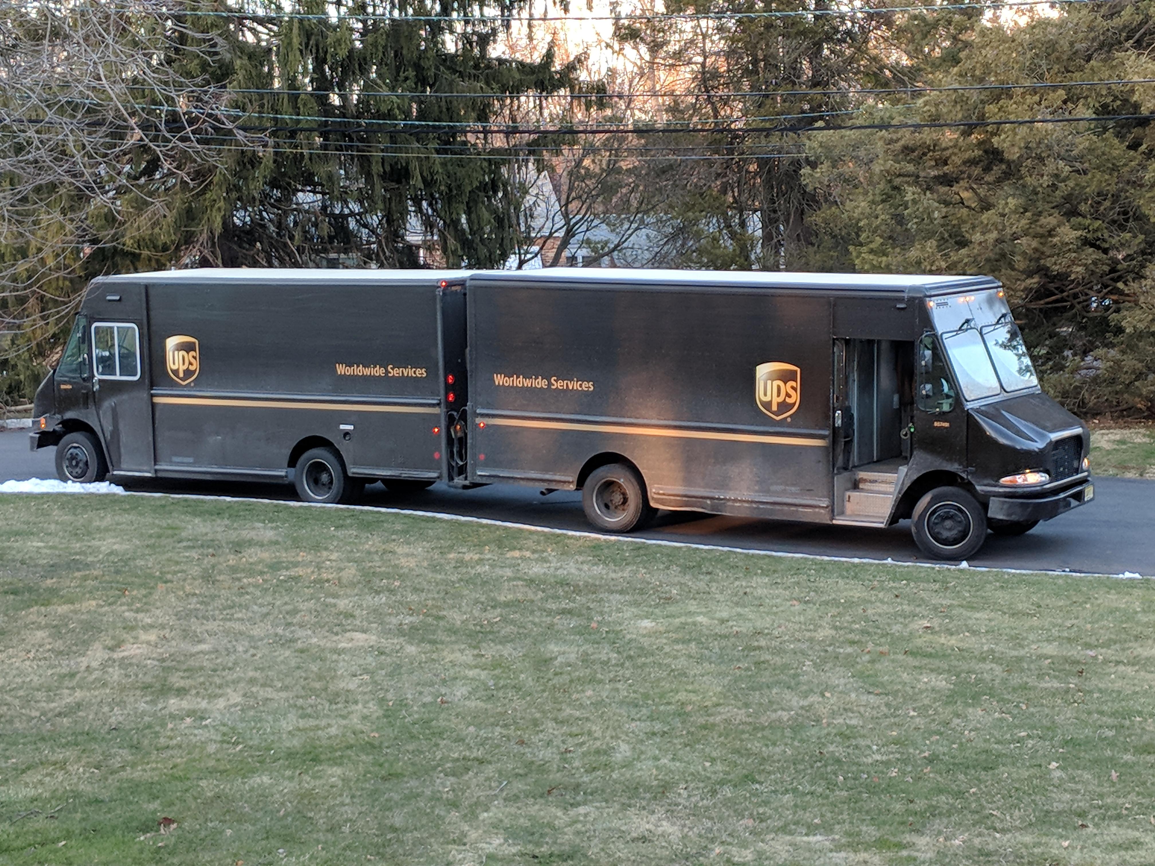 I stumbled across the rarely documented mating ritual of UPS trucks in