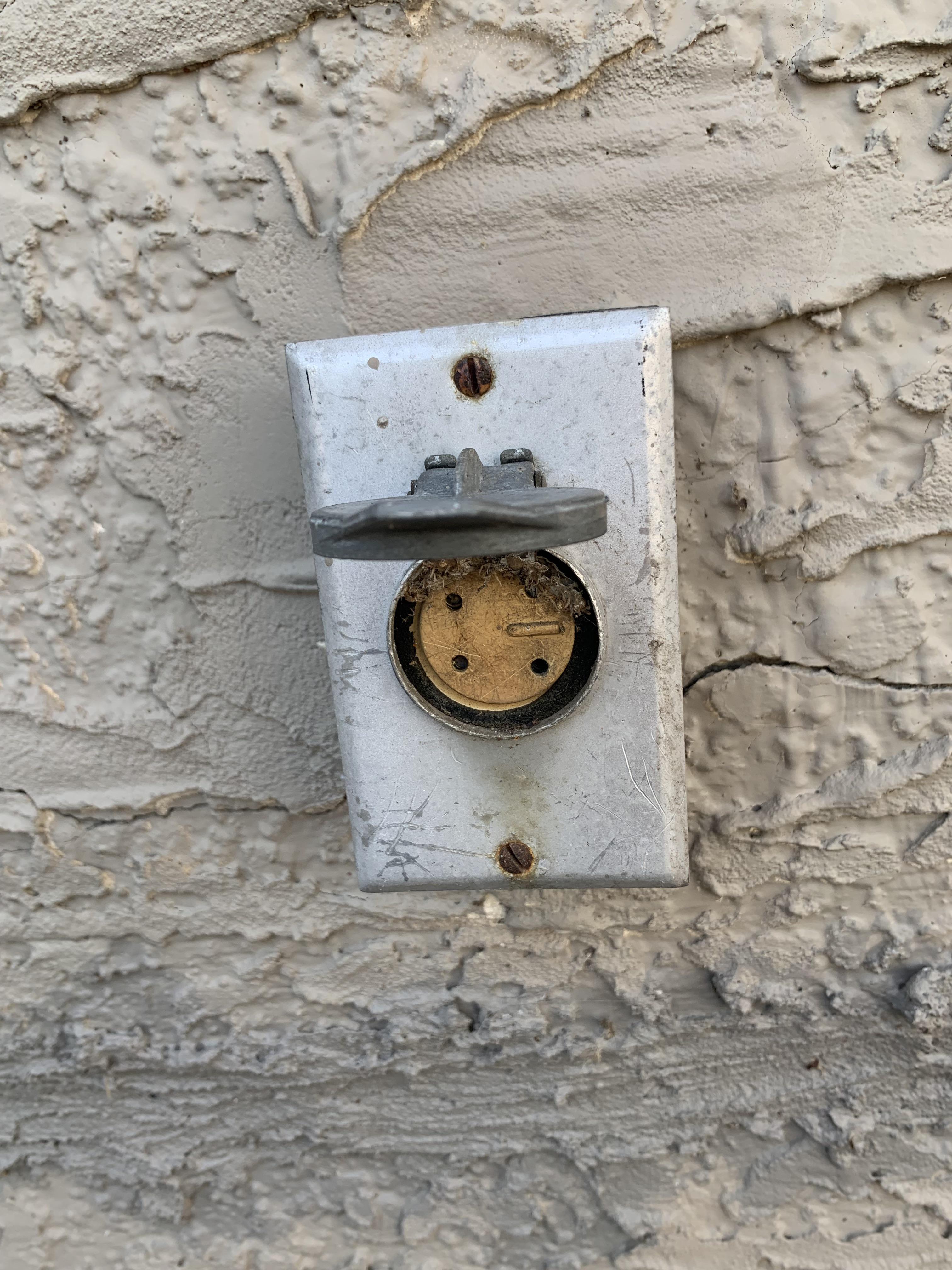 What is this outlet on the outside of the house? Any help would be