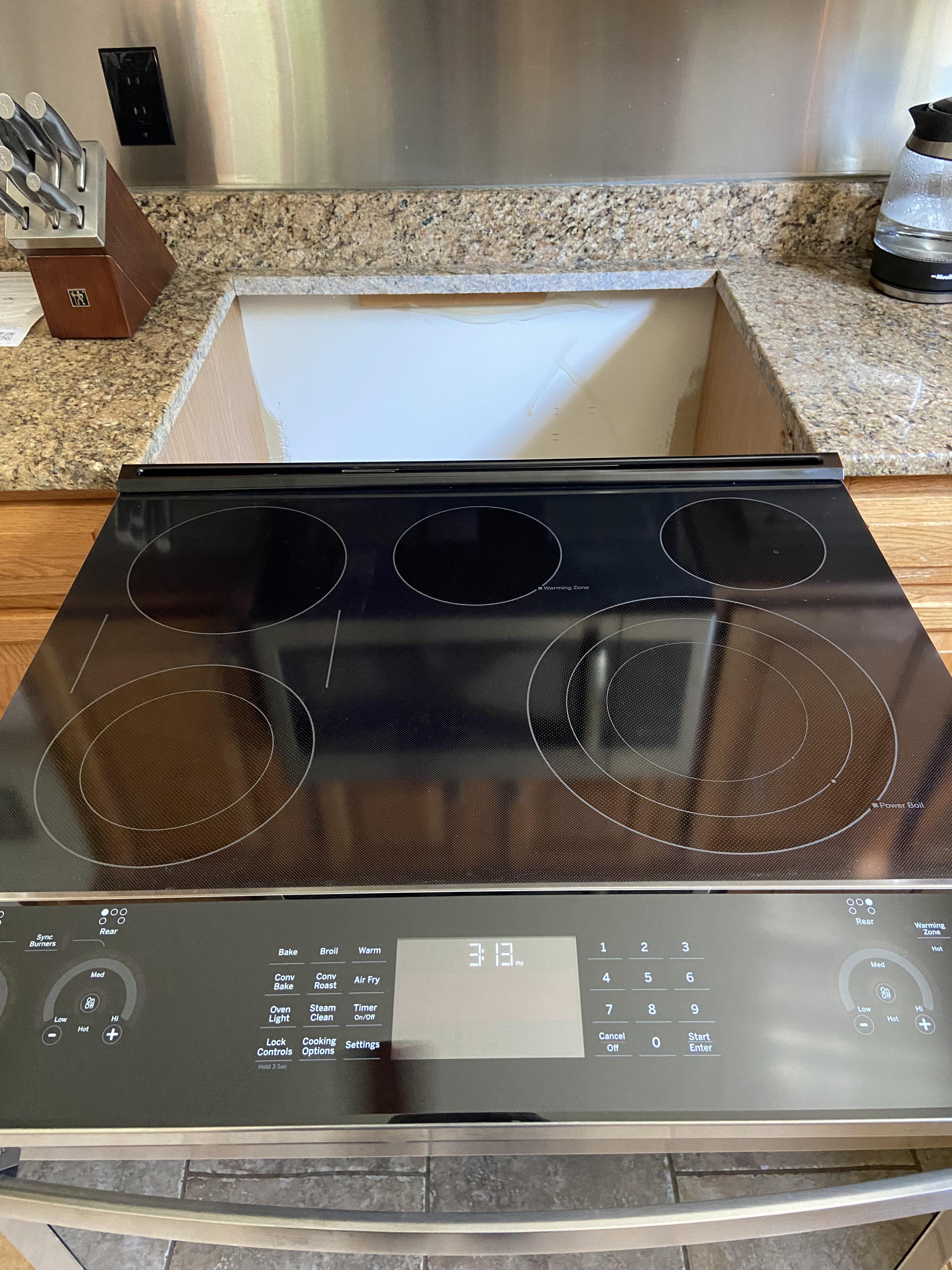 Our new oven is 1/4” too big for the existing spot