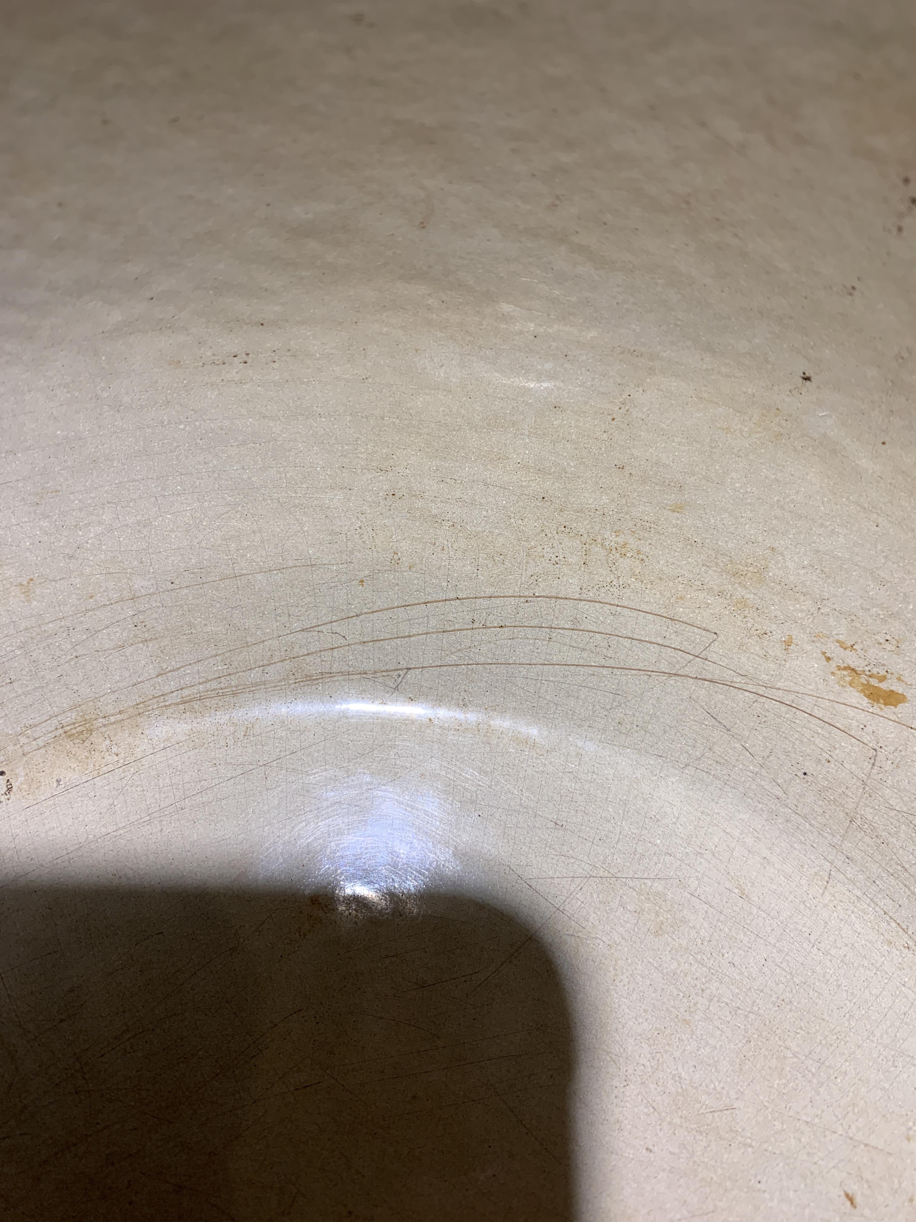 Are these scratches detrimental to the enamel of my dutch oven? r