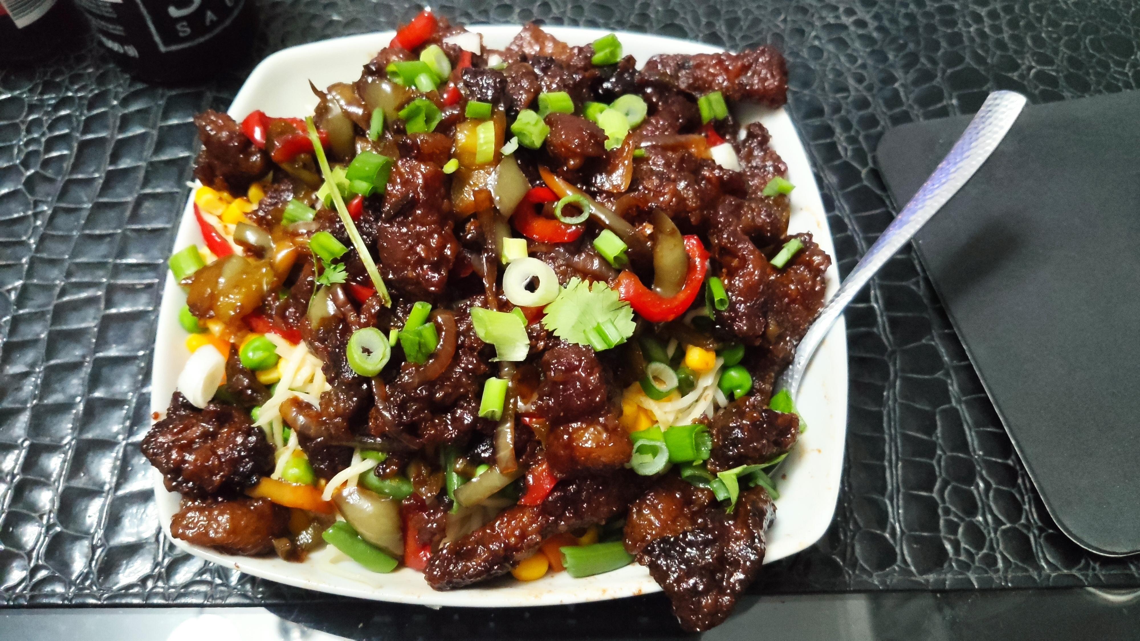 [Homemade] Crispy fried beef with chilli over noodles r/food
