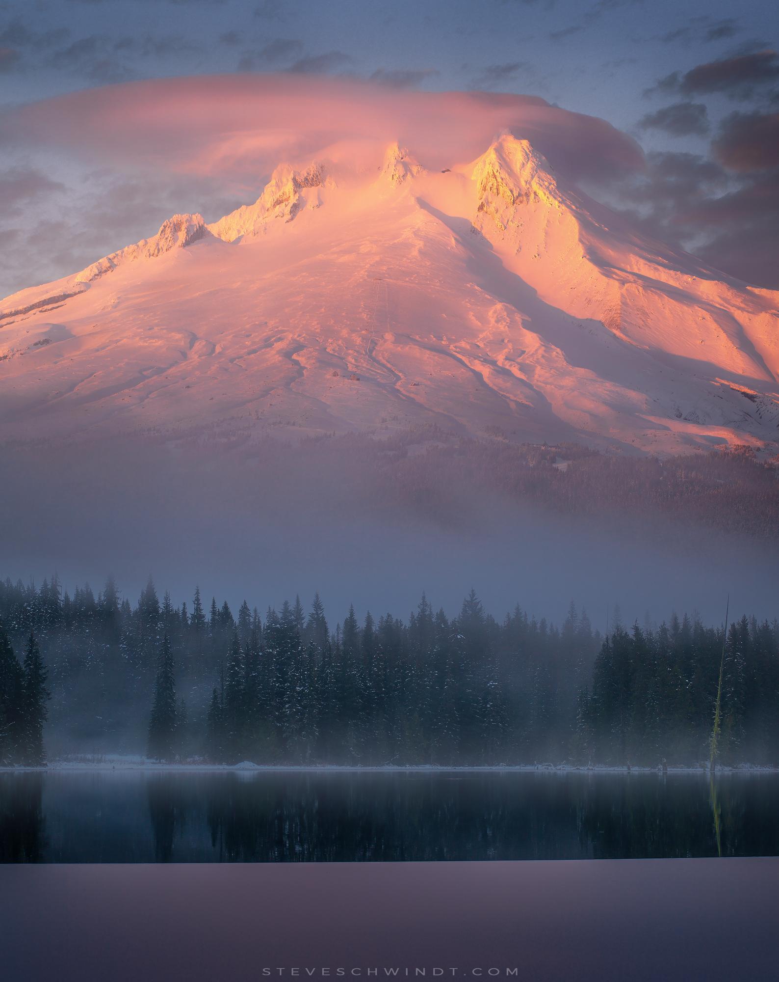 Fog rises beneath Mt. Hood along the banks of a half frozen Trillium